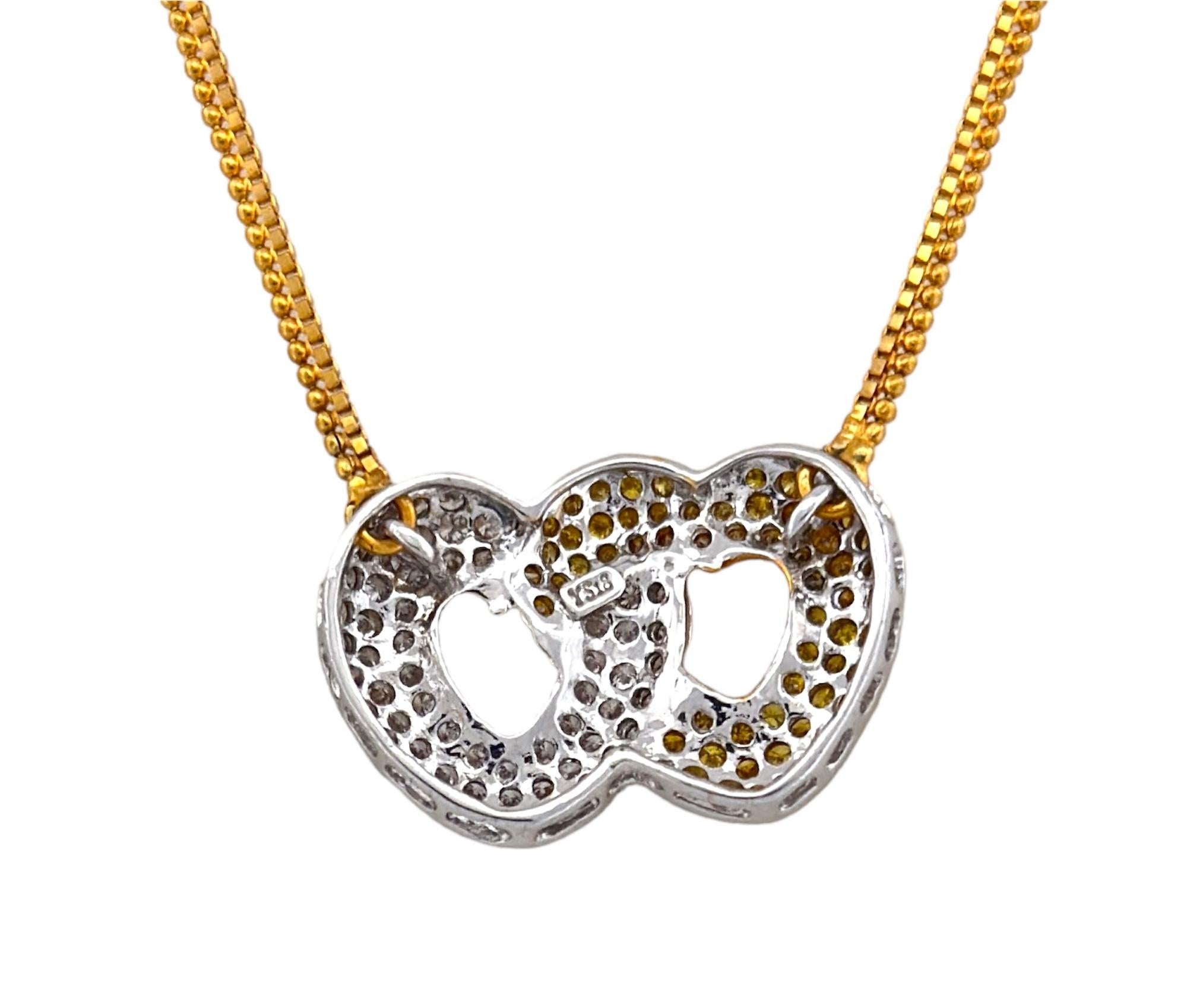 Round Cut Crisscross Heart Shaped Yellow And White Pendant For Sale
