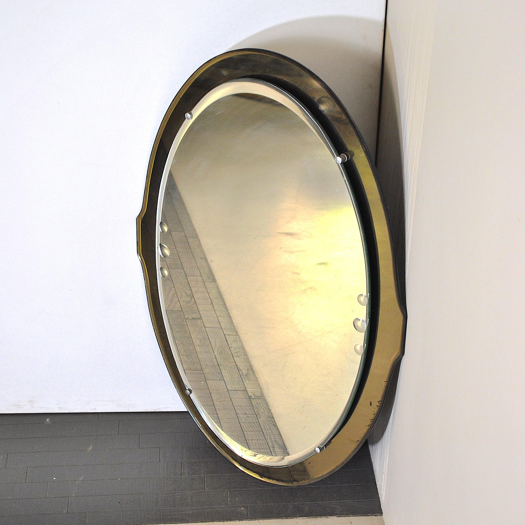 Cristal Art oval mirror worked inside and ground on the perimeter.