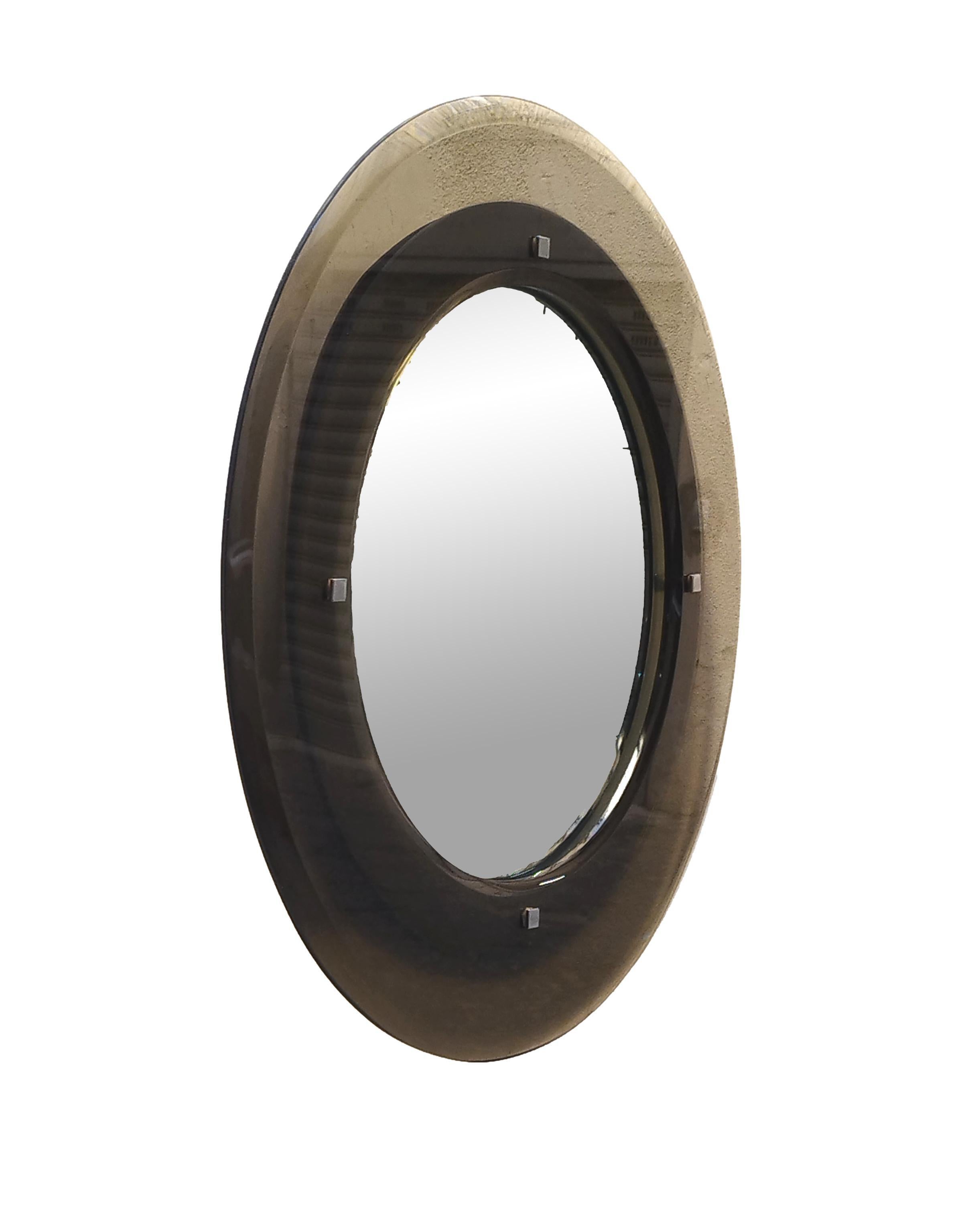Gorgeous circular wall mirror made of mirrored glass , chrome metal hooks and with beveled and beveled glass frame in warm and dark smoky dove-colored crystal glass by Cristal Art.
