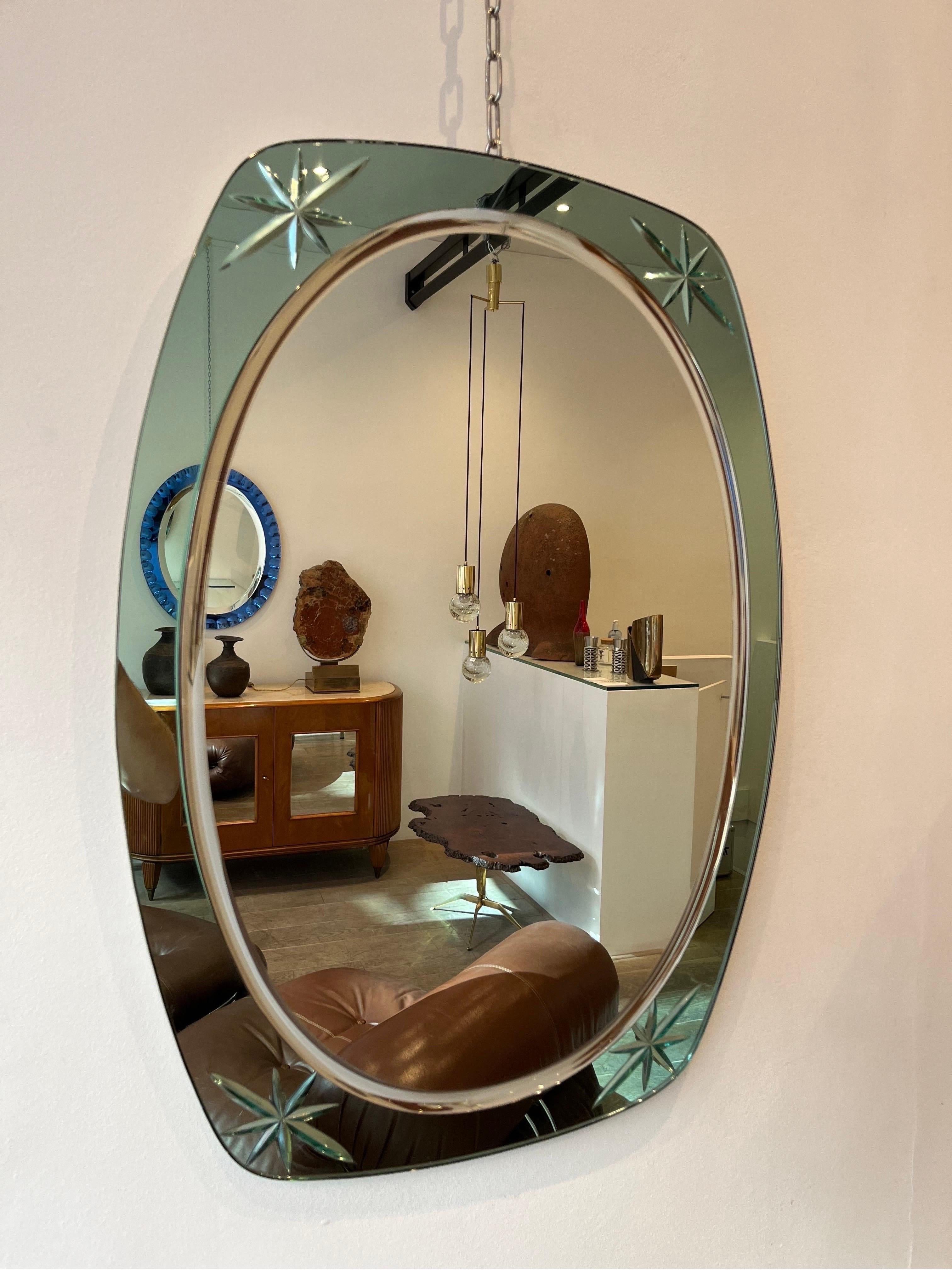 Cristal Arte is well known established decorative glass manufacturer from Torino in Italy. It reached its fame in the 1950s when the production of decorative mirrors was highly creative with innovative designs. The present mirror is water green