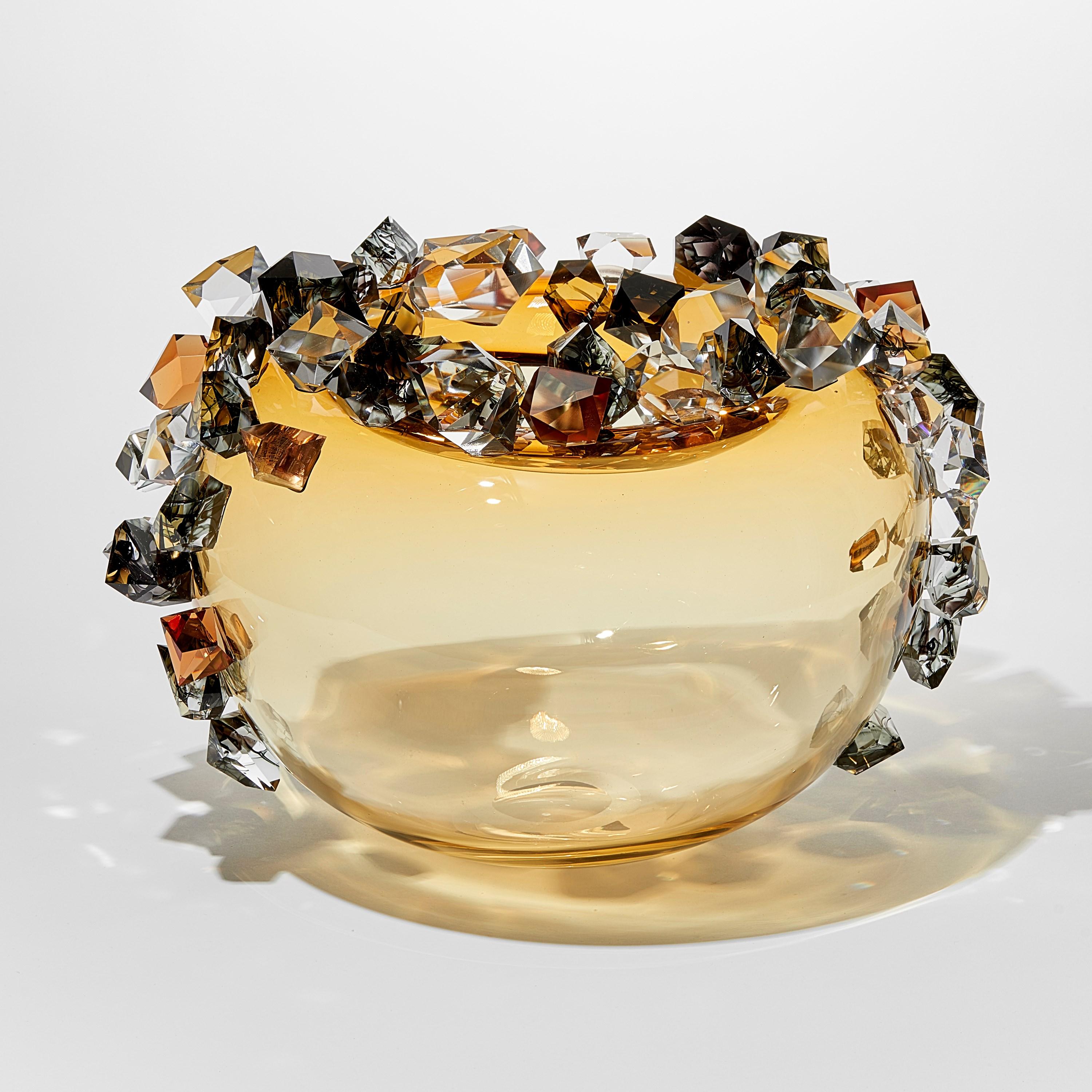 'Cristal Diffusion in Amber' is a unique glass sculptural vessel by the Danish artist, Hanne Enemark. The glass body has been hand-blown and painstakingly covered with cast and cut glass crystals, each made by hand by the artist.

With infinite