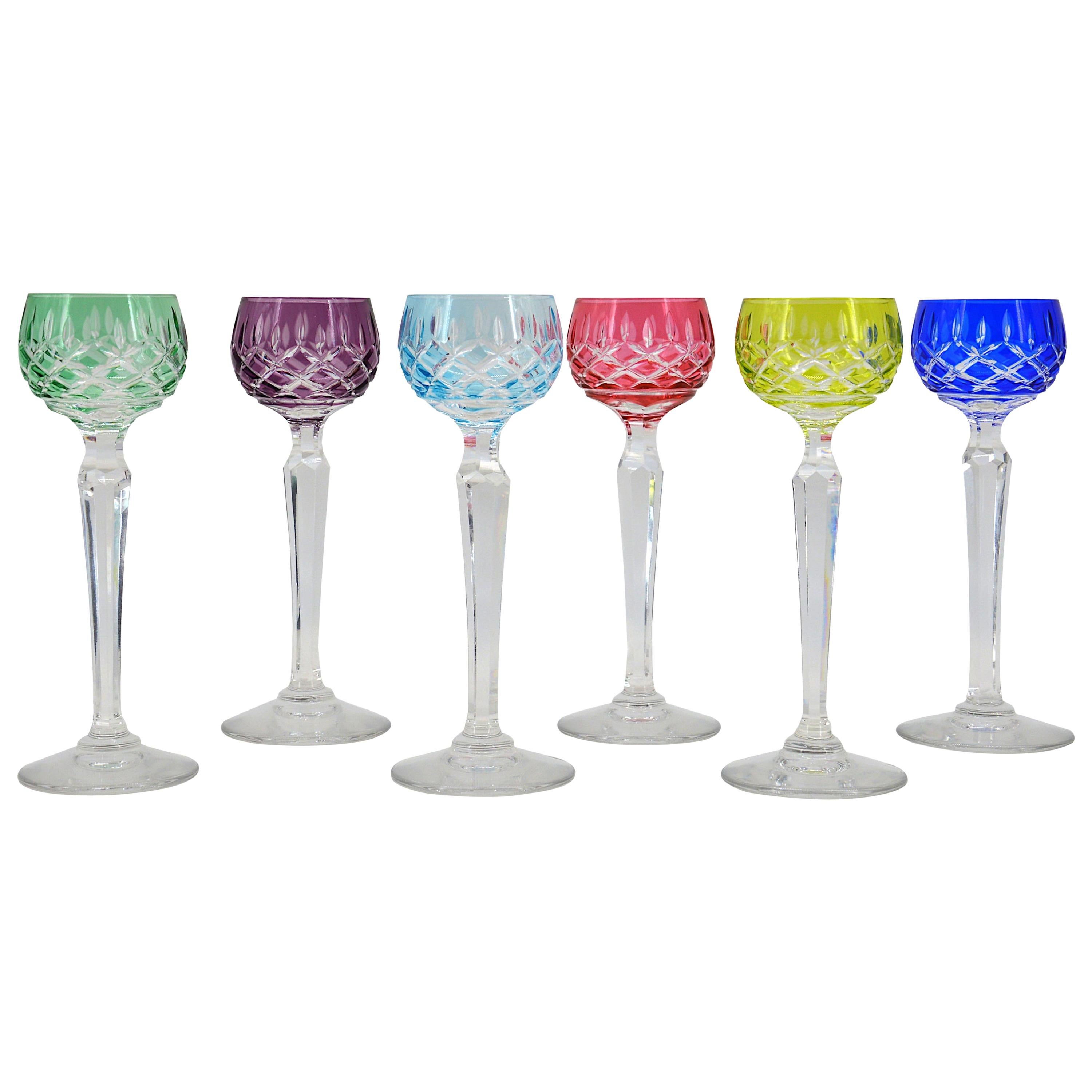 Set of 6 colored crystal glasses by Cristallerie Lorraine de Lemberg, France, 1920s. In their original box. These glasses were handcut at the Lorraine factory in Lemberg in the late 1920s. They can be used for aperitif as well as for the digestive.