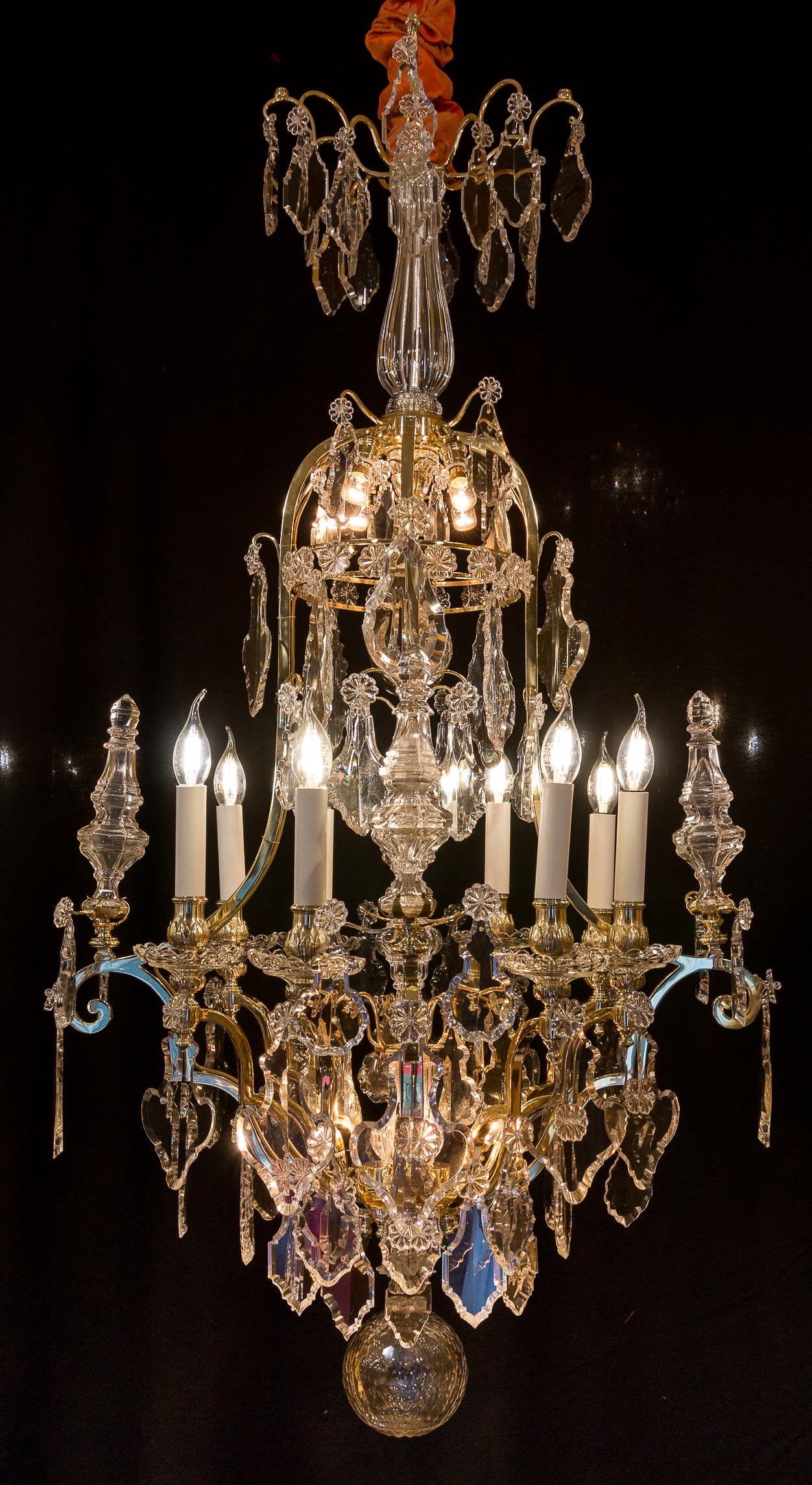 Sign by The Cristalleries De Baccarat, French Louis XIV style, gilt bronze and cut-crystal chandelier, circa 1880-1890.

A large beautiful gilt bronze and handcut crystal, chandelier in the Classic Louis XIV style. 
Our chandelier is composed of