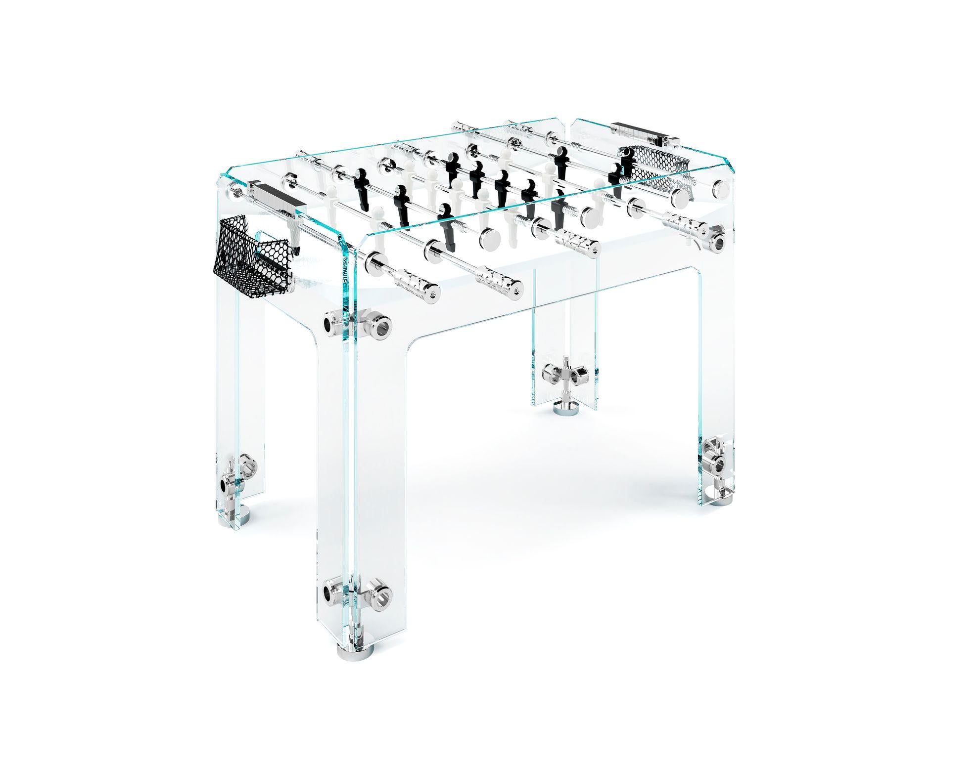 Cristallino Outdoor Foosball designed by Teckell. The playing field is structured with white Corian and teams of players are covered with black or white epoxy. Chromes brass is used for feet, handles, and joints. Telescopic bars are structured with