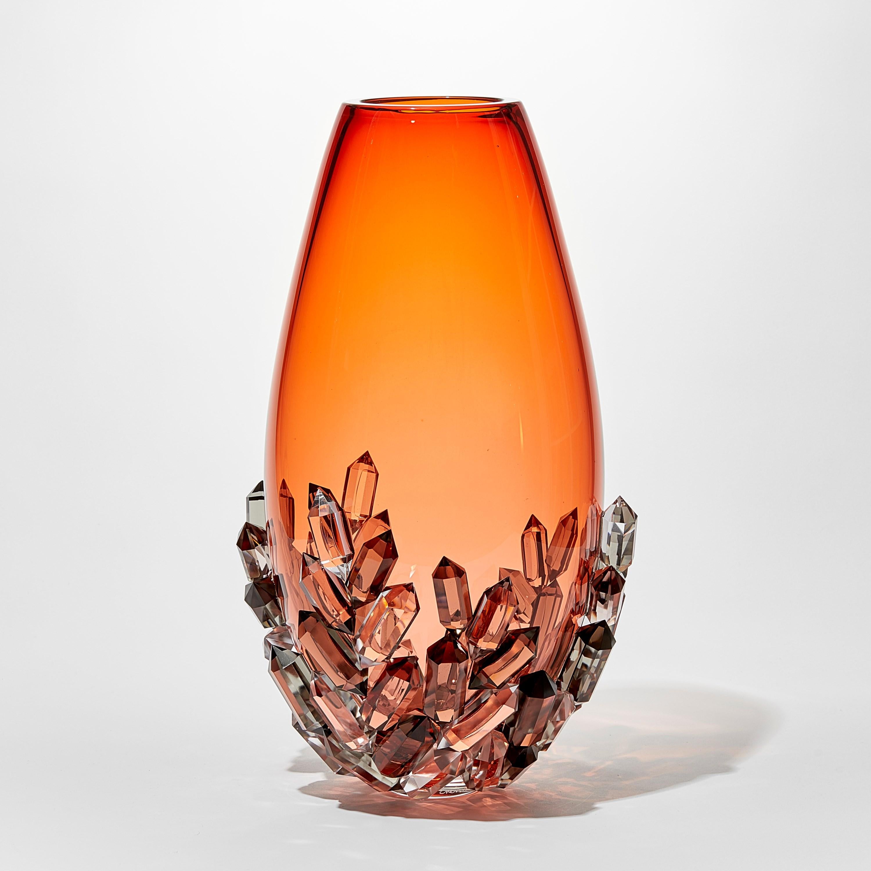 'Cristallized Aurora' is a unique glass sculptural vessel by the Danish artist, Hanne Enemark. The glass body has been hand-blown and painstakingly covered with cast and cut glass crystals, each made by hand by the artist.

With infinite fascination