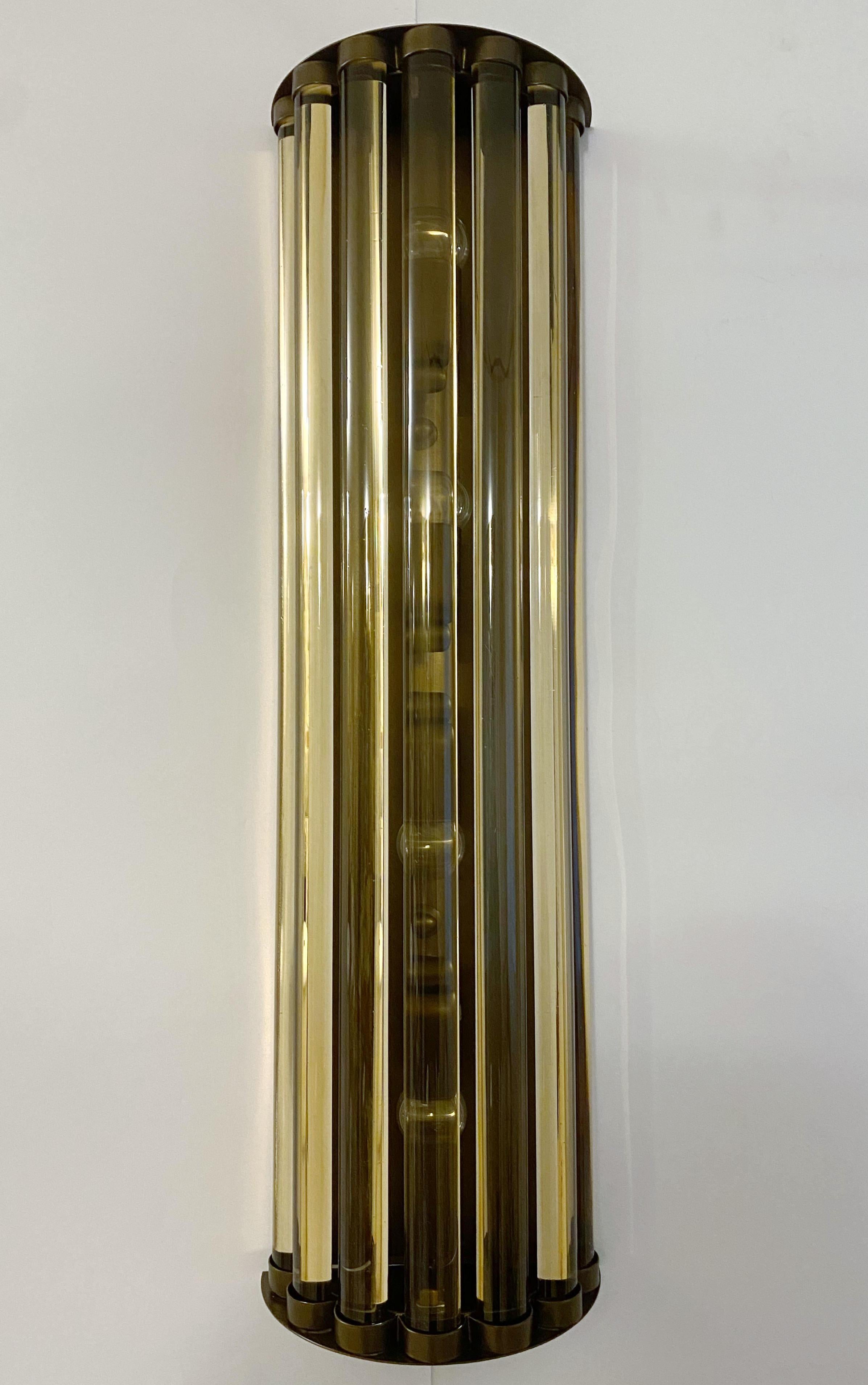 Italian wall light or flush mount with smoky colored long crystal bars mounted on bronzed metal finish / Designed by Fabio Bergomi for Fabio Ltd / Made in Italy
4 lights / E12 or E14 type / max 40W each
Measures: Height 28 inches / Width 8 inches /