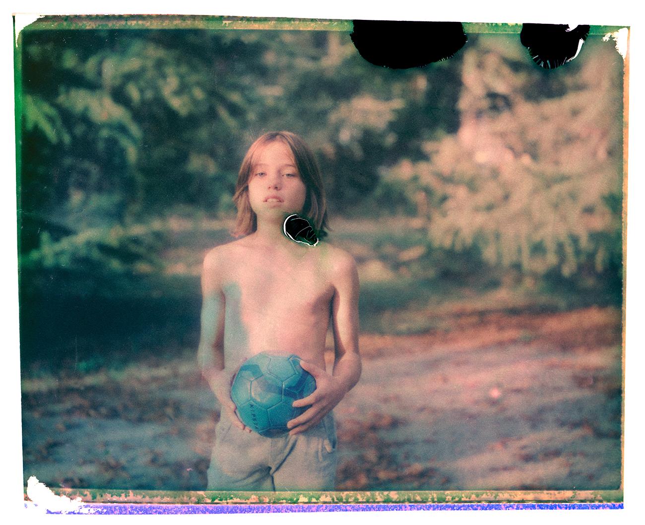 Cristina Fontsare Color Photograph - Gil at twelve - Contemporary, Polaroid, Photograph, Childhood, abstract