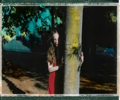 Lucia à quinze ans derrière la forêt - Contemporary, Polaroid, Photograph