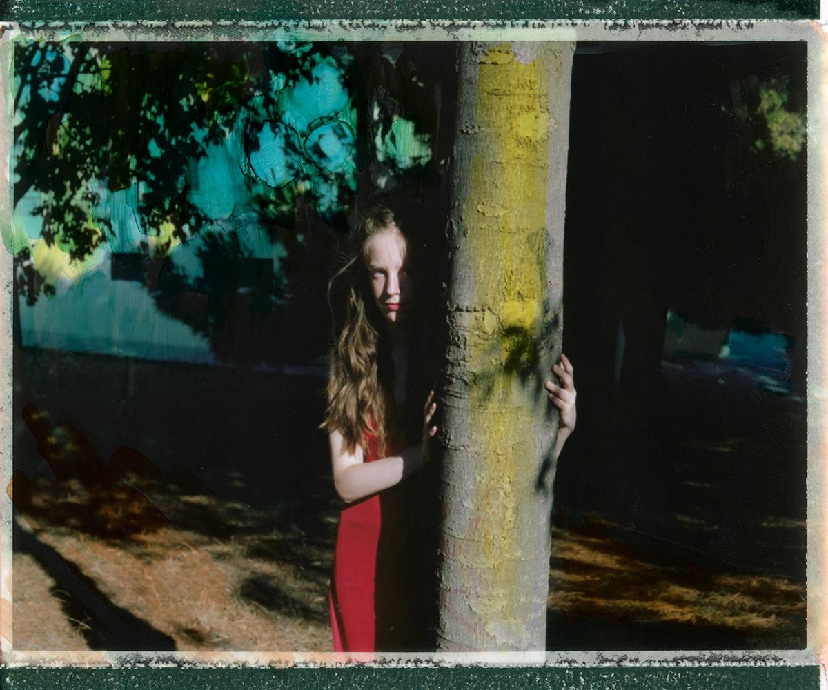Lucia à quinze ans derrière la forêt - Contemporary, Polaroid, Photograph