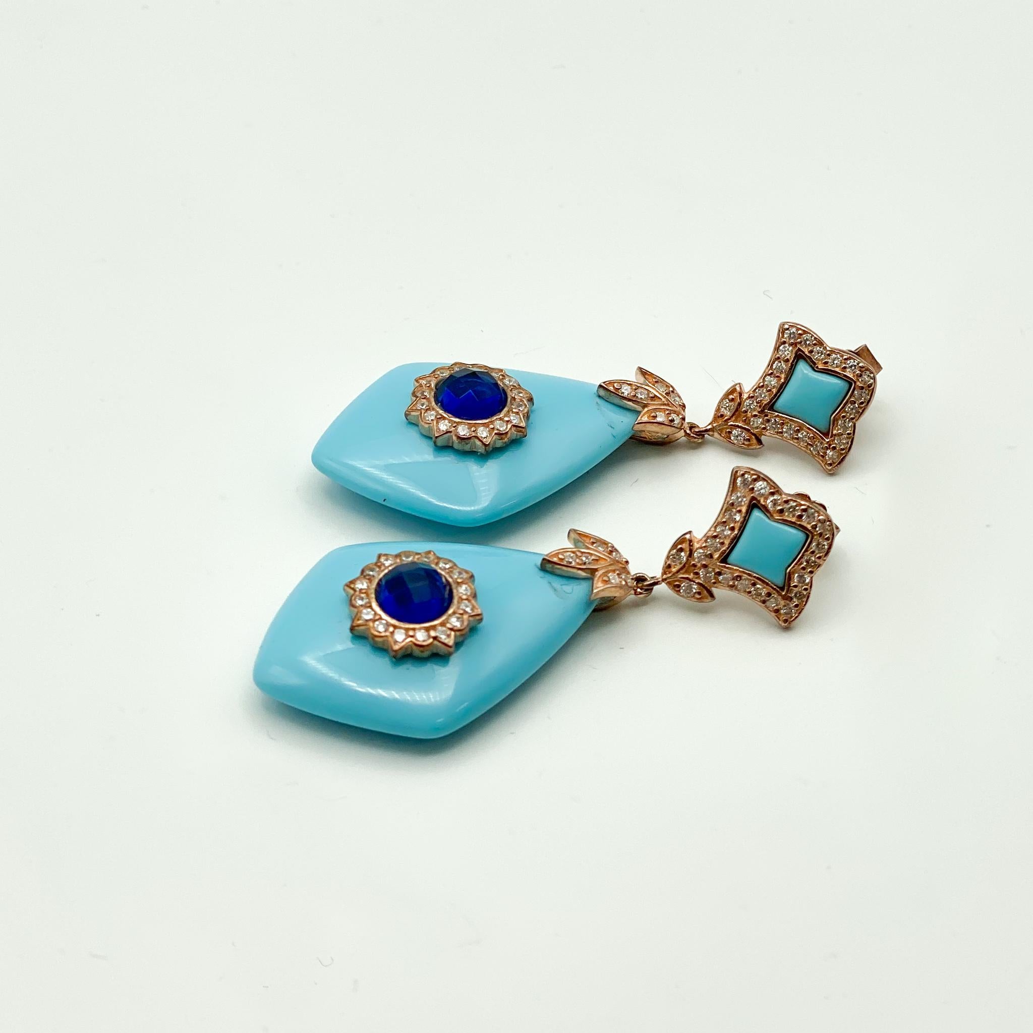 Cristina Sabatini design
Rose Gold Plated Sterling Silver & Natural Gemstones 
Shapes of blue, rose, & gold
Approximately 2.5 inches in length 