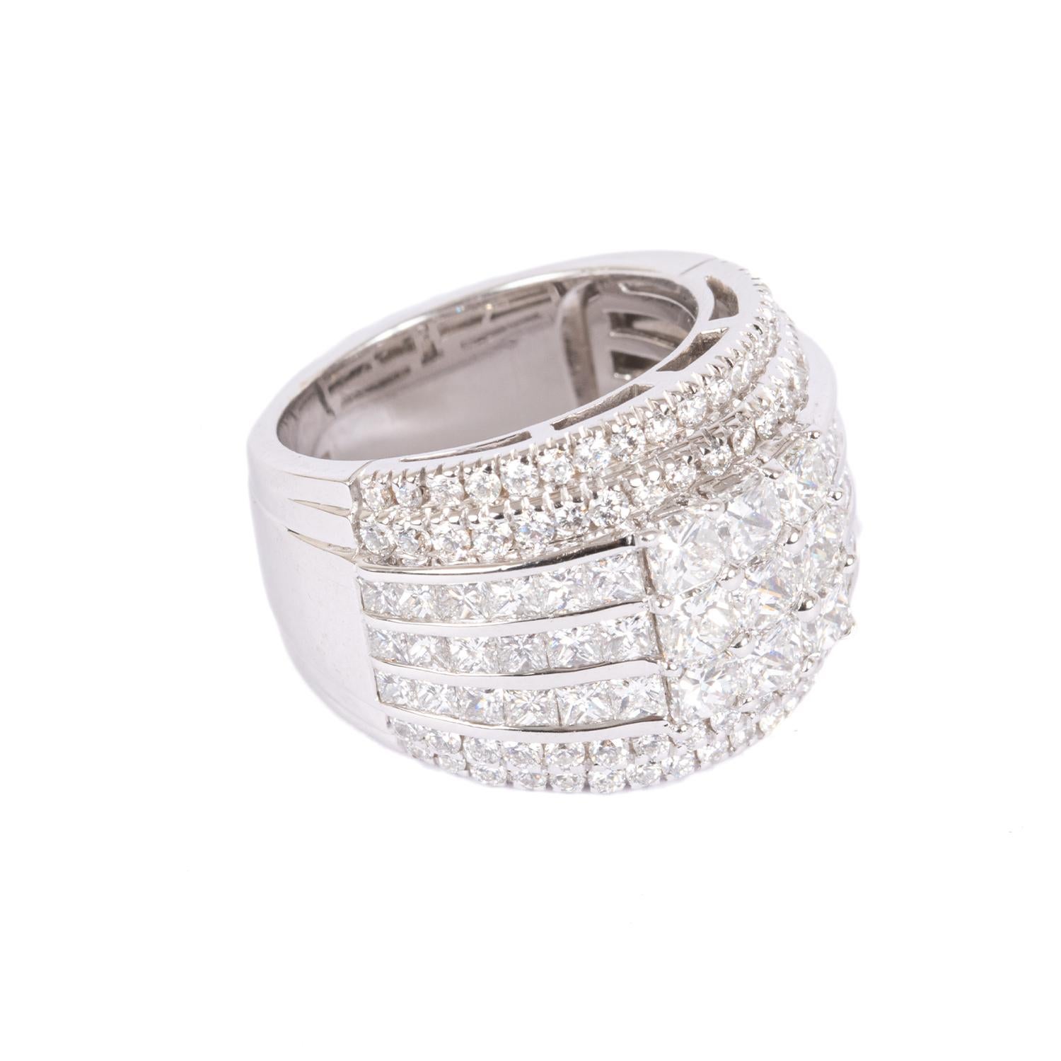 Beautiful ring by Crivelli.  A very elegant white gold band ring with wonderful Ct. 3,78 princesse diamonds and ct. 1,78 round brilliant diamonds. 
Size IT 14 , US 6,75