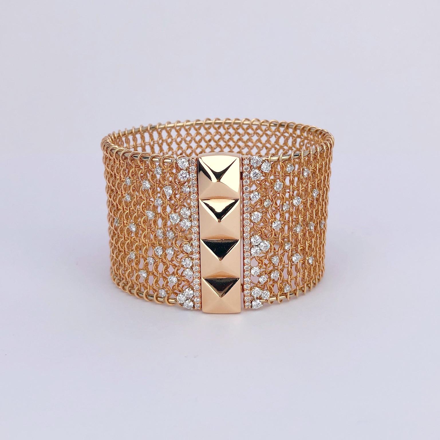Crivelli 18 karat rose gold wide cuff bracelet. The bracelet is designed with a hard 