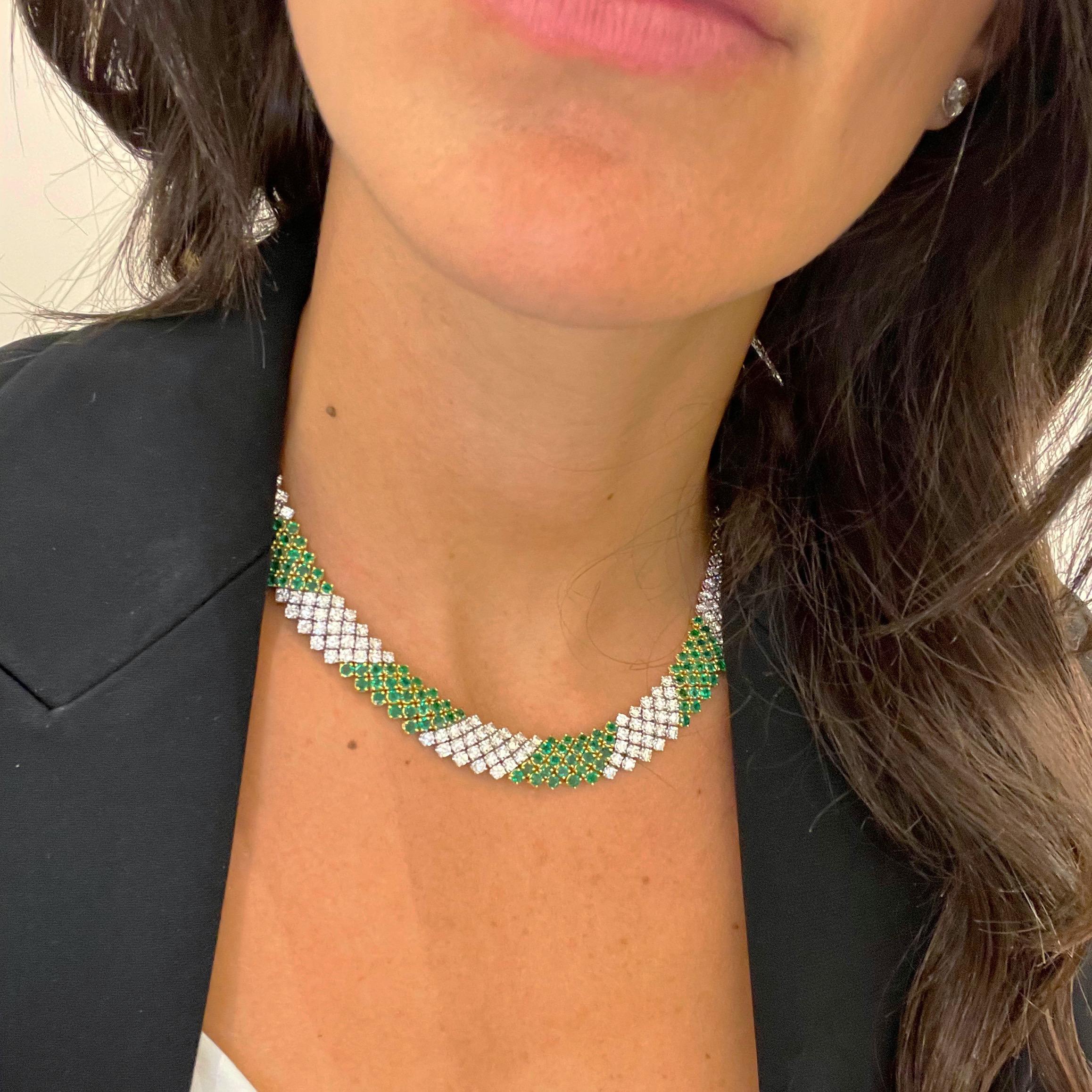 This lovely designed collar necklace by Crivelli is entirely set with 5 rows of round brilliant Diamonds and Emeralds. The alternating stones and the flexibility of the setting will lay beautifully around the neck. The necklace measures 16