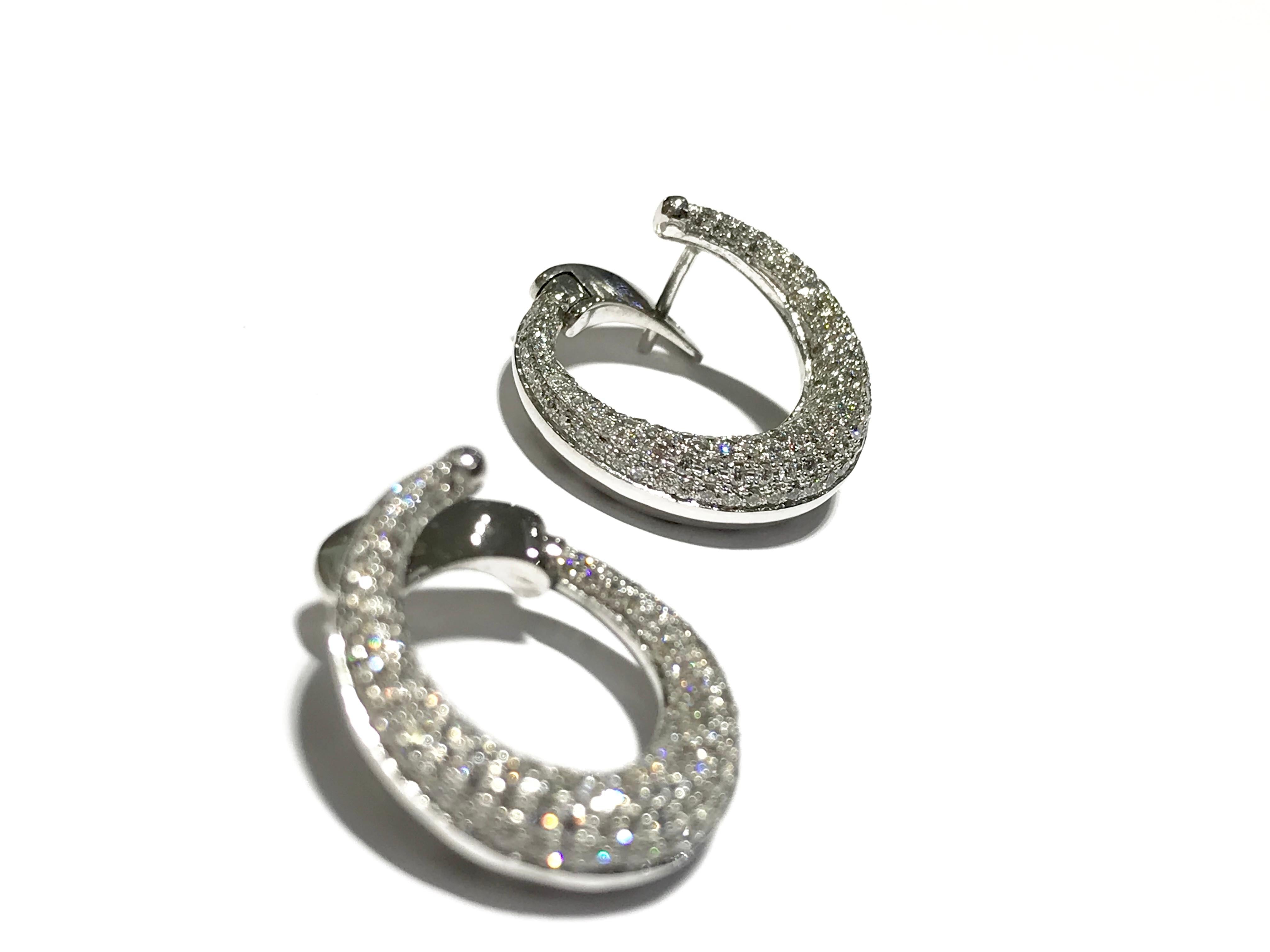 Crivelli C shaped diamond earrings with 2.30 carat diamonds VS clarity EF colour
18 karat white gold 
Italian Made 
Pave diamond style 