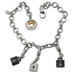 Crivelli Charm Bracelet in 18 Karat White Gold and White and Black Diamonds