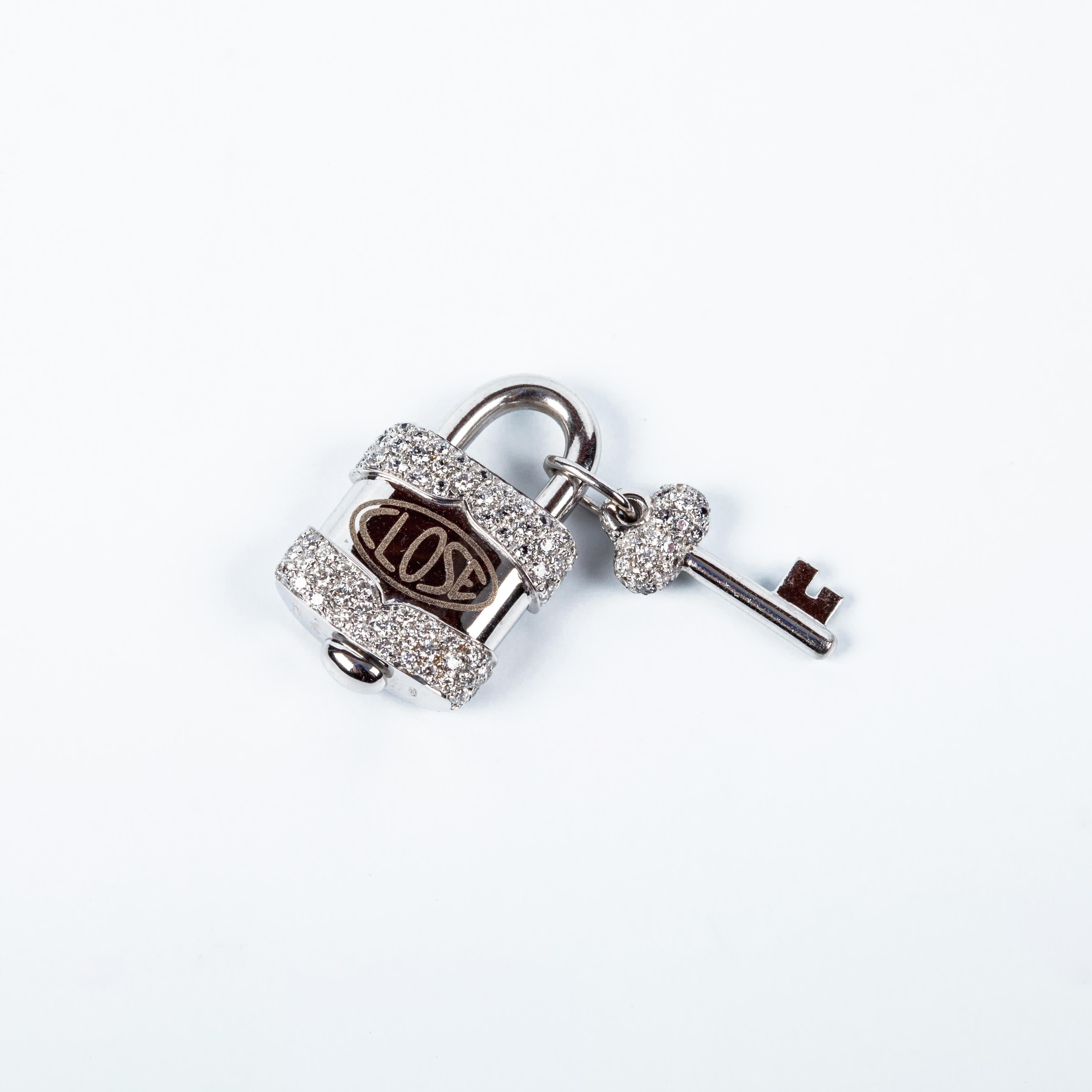 Charm Link Lock Pendant or Closure 18 Karat White Gold and Diamonds Open Close was founded in Valenza Italy in the 70’s, when Bruno Crivelli decided to transcend his vast experience and craftsmanship to form what is known today as: Crivelli