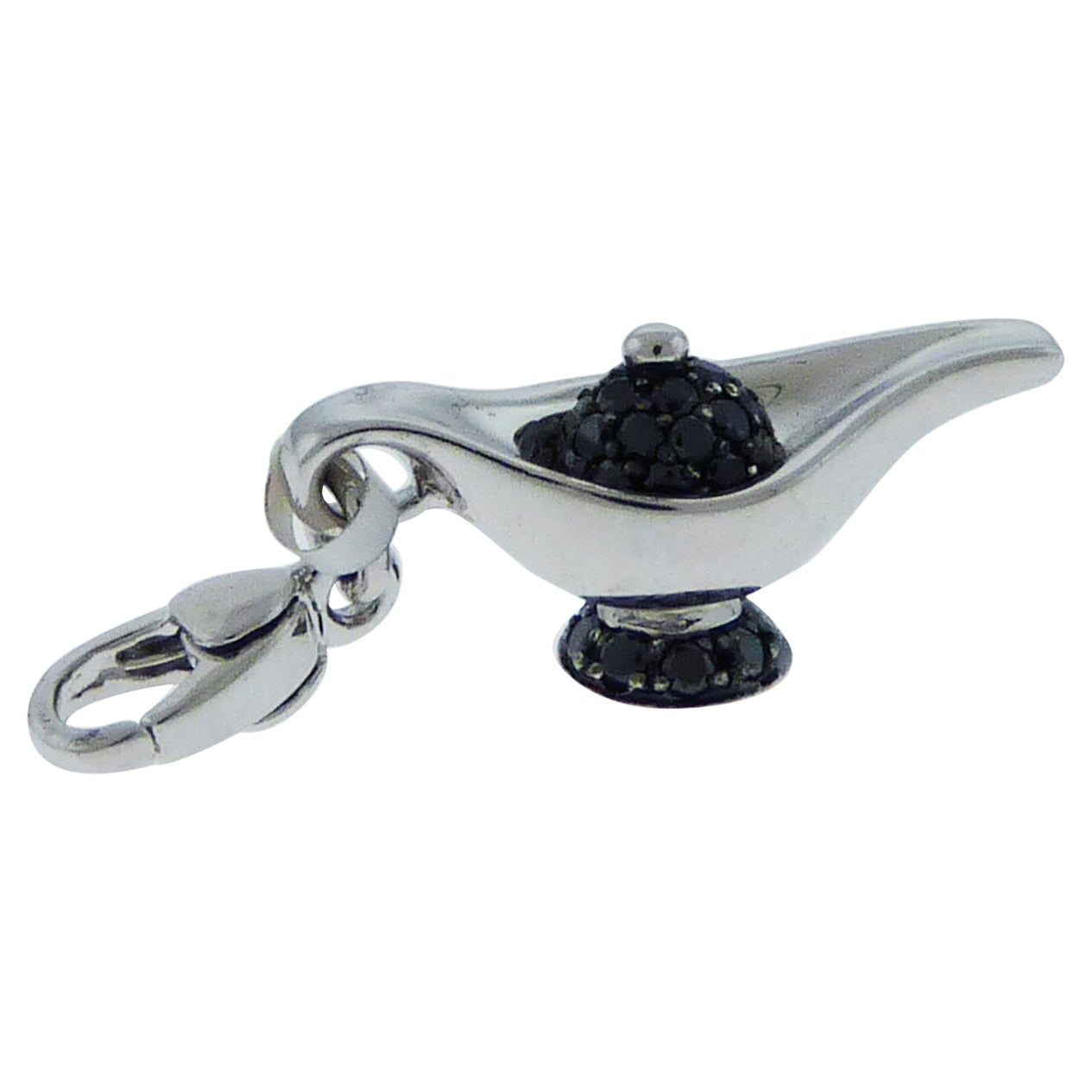 Lamp bracelet charms embellished with diamonds and set in 18K gold. Made in Italy by Crivelli.
Available in 18K yellow gold with white or black diamonds. Or in white gold with black diamonds.
The length of each lamp is 0.75 inches.
The height is 0.3