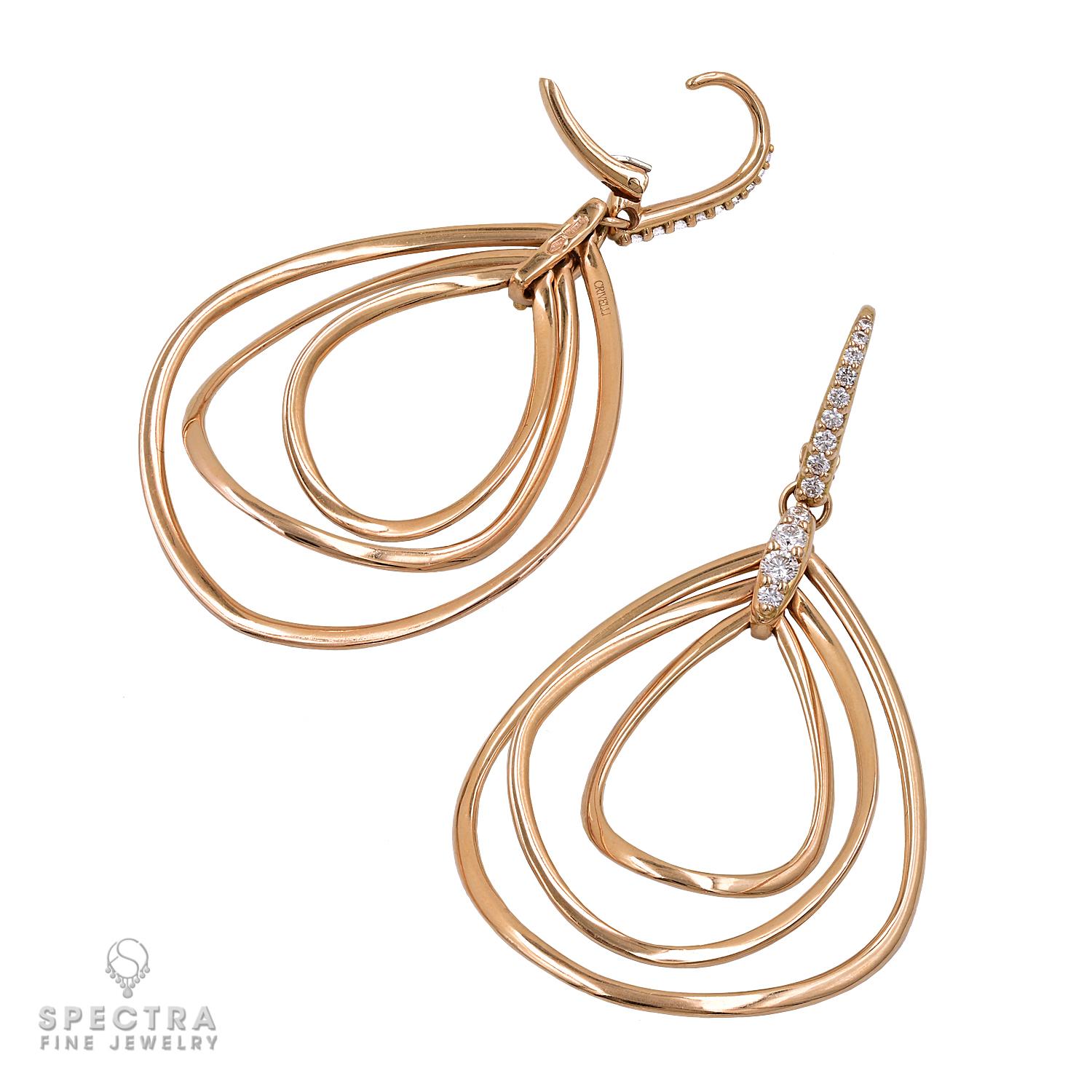 Fashioned from 18K yellow gold, this slightly asymmetrical sculptural pair of earrings showcases three nested openwork teardrops, gently hammered flat with organic curves that appear handcrafted, creating the illusion of floating as a unified