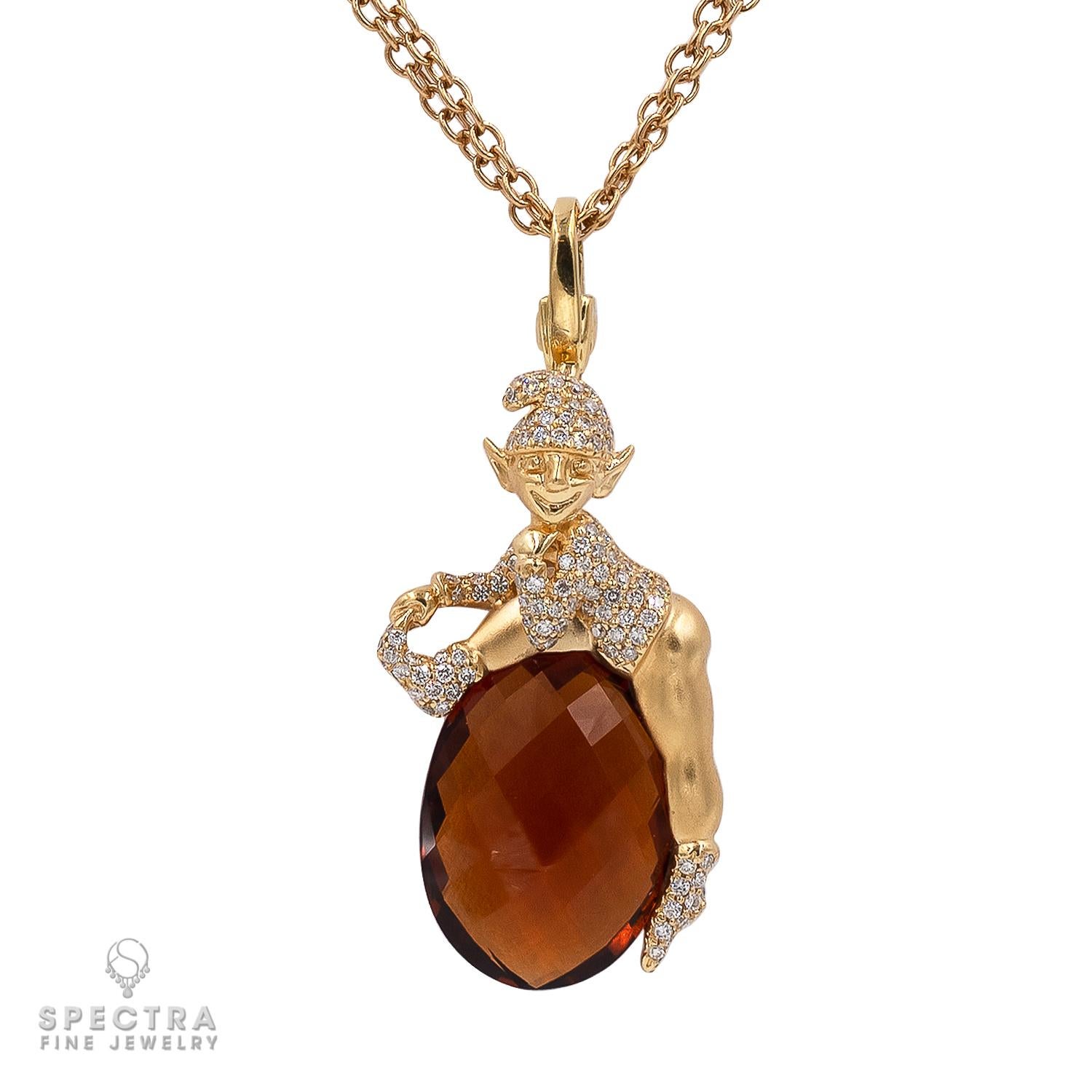 Indulge in the whimsical charm of this finely crafted pendant, a delightful creation from the esteemed artisans at Crivelli in Italy. Fashioned from solid 18K Yellow Gold, it showcases a playful Elf perched atop a gleaming Gem (brown topaz), evoking