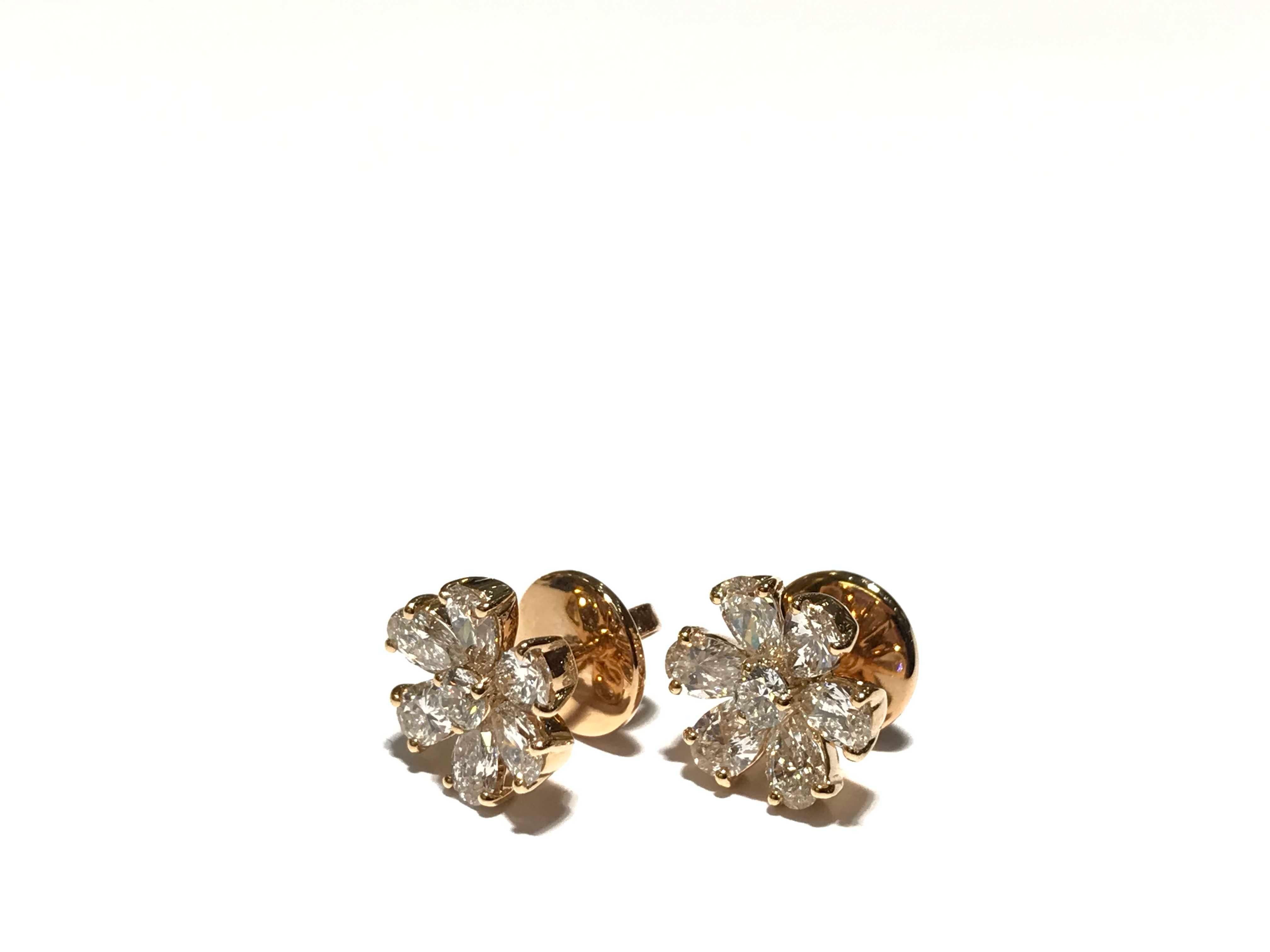 Crivelli Flower diamond Earrings set in 18k pink gold with white diamonds
diamonds 2.00 carat VS clarity EF colour 
12 pear shape
2 round shape in the center