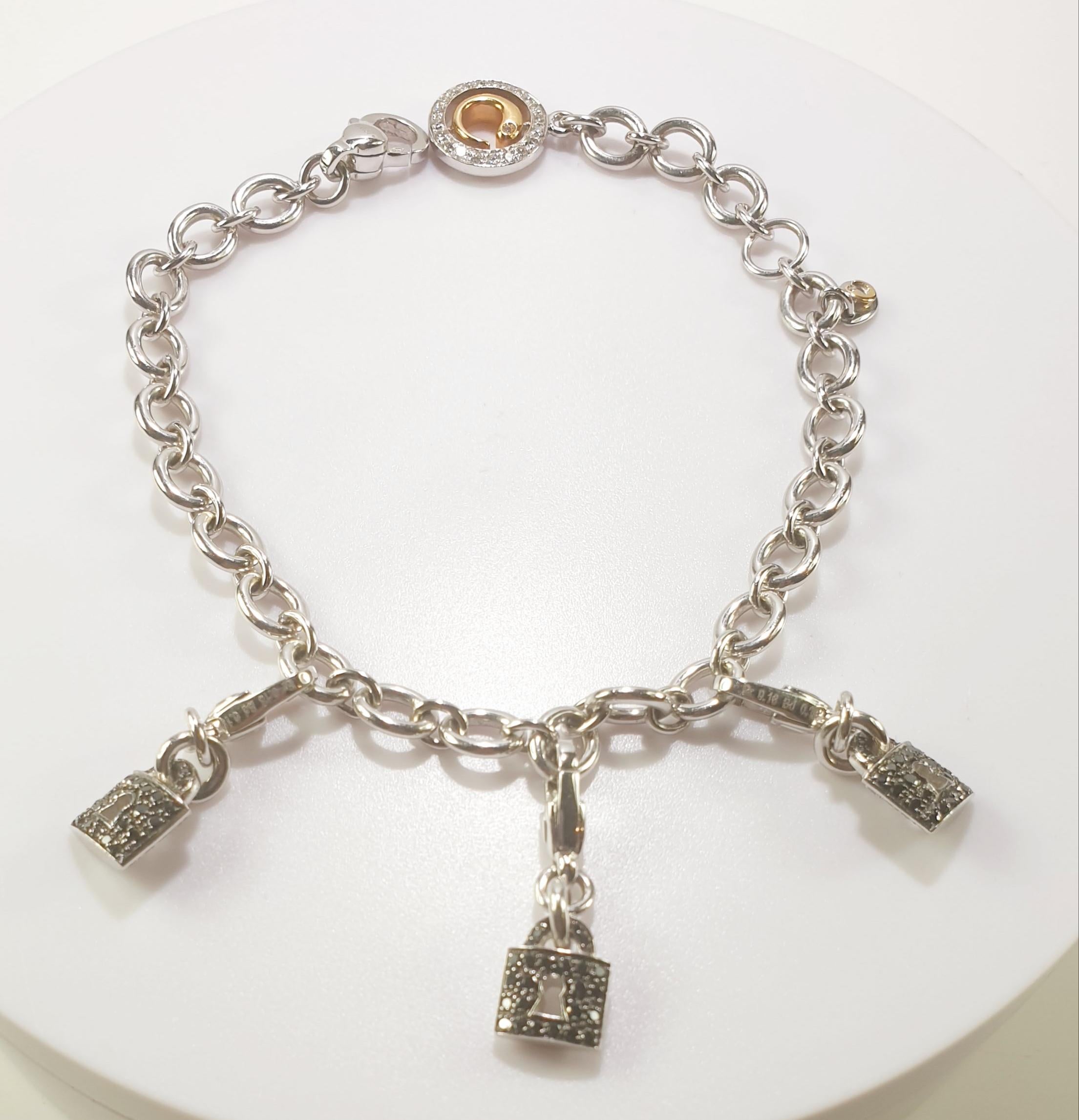 Crivelli Lock Charm-Armband aus 18 Karat Weißgold mit weißenen und schwarzen Diamanten (Brillantschliff) im Angebot