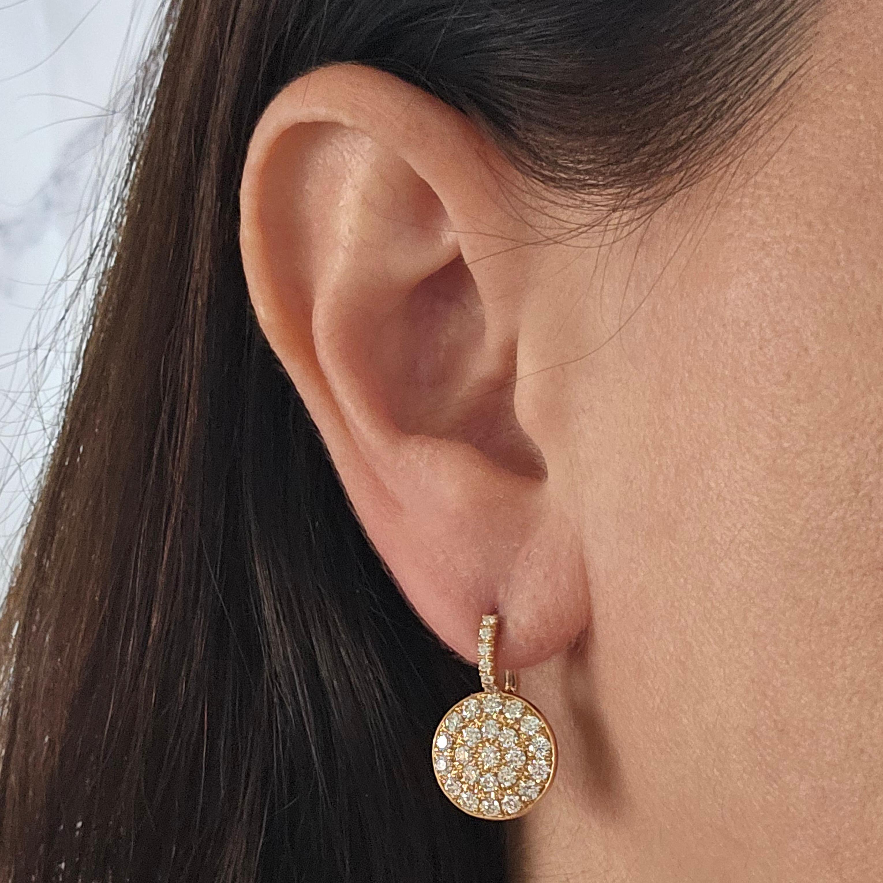Crivelli 18 Karat Rose Gold Drop Earrings Featuring A Pave Disc. 58 Round Brilliant Cut Diamonds Of Vs Clarity And G Color Total Approximately 1.80 Carats. 0.9 Inch Long. Curved Post With Hinged Clip Back. Finished Weight Is 6.3 Grams.