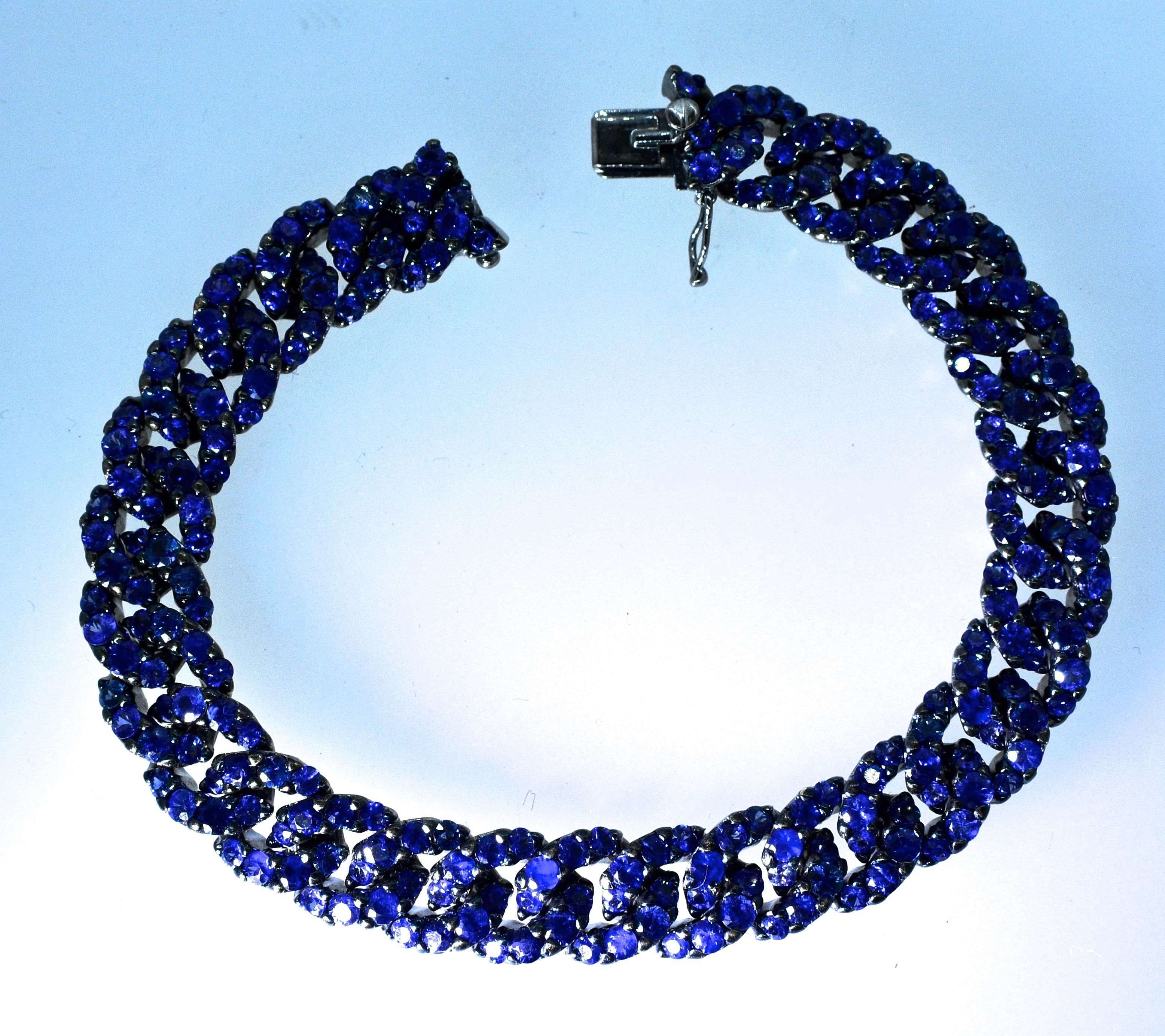 Crivelli bracelet pave set with 232 fine bright natural blue sapphires, all well matched and well cut, weighing exactly 16.26 cts., (marked with the weight on the verso), this link bracelet is 7.25 inches long and in excellent condition.