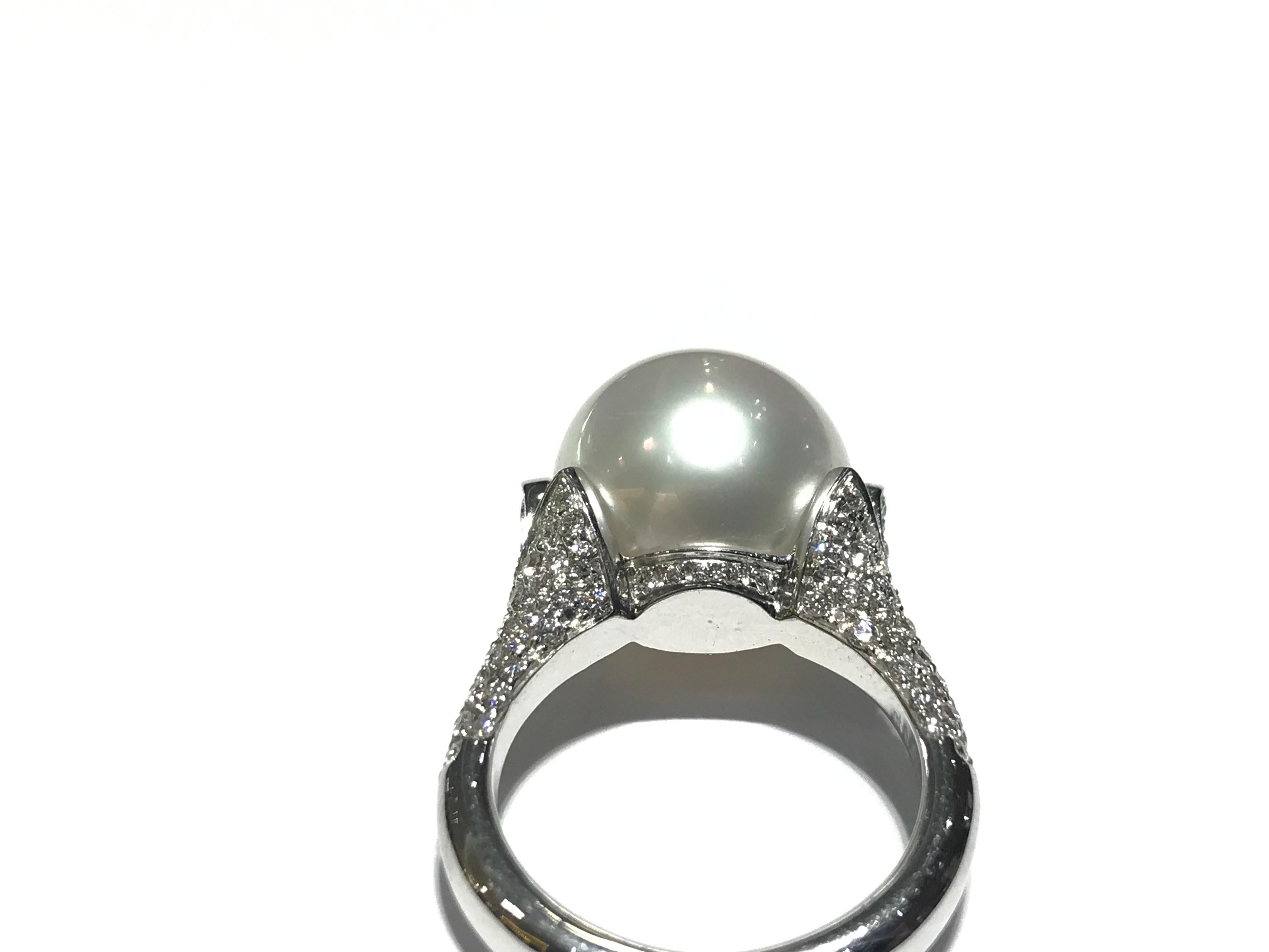Crivelli South Sea Pearl with Diamond setting in 18kt White gold 
14.5 mm South Sea Pearl
0.55ct diamonds on setting VS clarity EF colour
18kt white gold setting