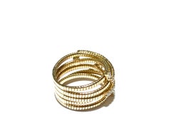 Crivelli twist flat wire ring with 5 rows 0.68 carat diamonds set in 18 kt gold