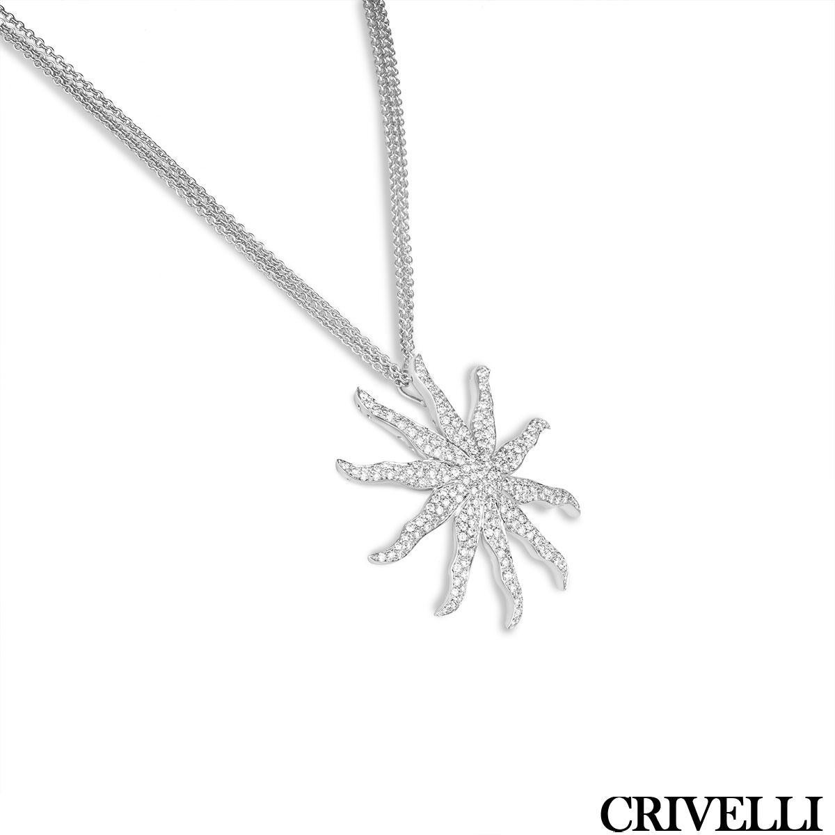 A striking 18k white gold diamond pendant by Crivelli. The sun shaped motif pendant is pave set throughout with 255 round brilliant cut diamonds with an approximate total weight of 4.60ct, E-F colour and VS clarity. The motif is suspended from a