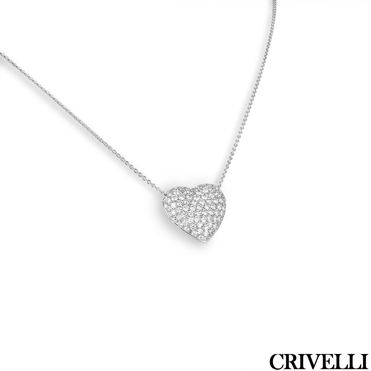A lovely 18k white gold diamond set pendant by Crivelli. The heart motif pendant is pave set throughout with 94 round brilliant cut diamonds, with an approximate total weight of 2.34ct, E-F colour and VS clarity. The pendant is suspended evenly from