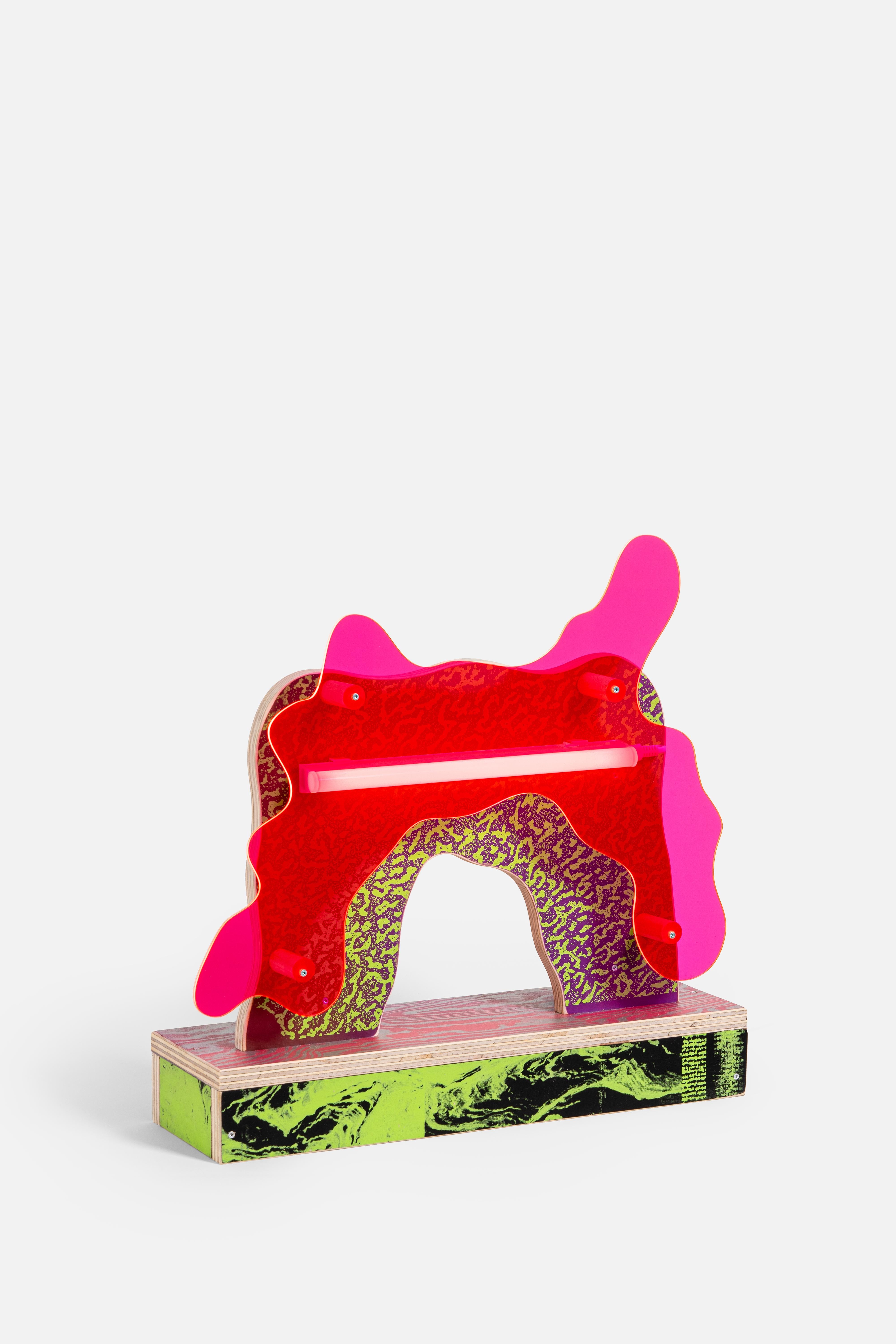 This table light is a one-of-a-kind piece, designed and crafted in 2024 by the duo Edizioni Brigantino.
Their practice is a vibrant and playful fusion of contemporary art and design. The work is made using Chilean pine plywood as a base, adorned