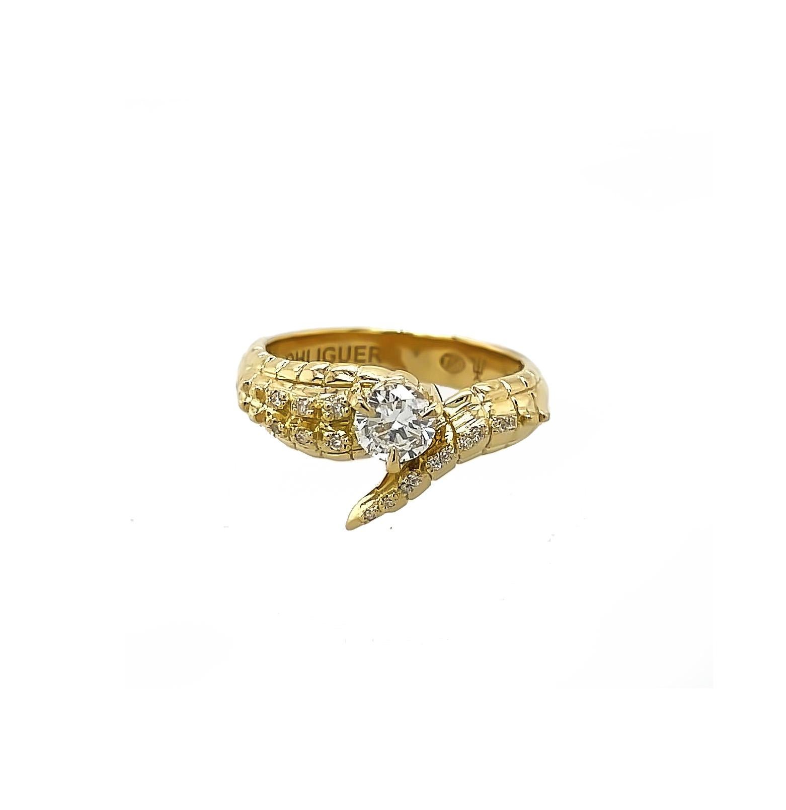 Making a strong yet playful statement, the croc tail ring is designed in 18ct gold. Subtle spikes echo the powerful form of the Australian saltwater croc in this iconic ring.

Intricate croc-skin filigree
Ethically sourced gold
Available in 18ct