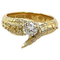Anello con diamante a coda di coccodrillo in oro giallo 18ct
