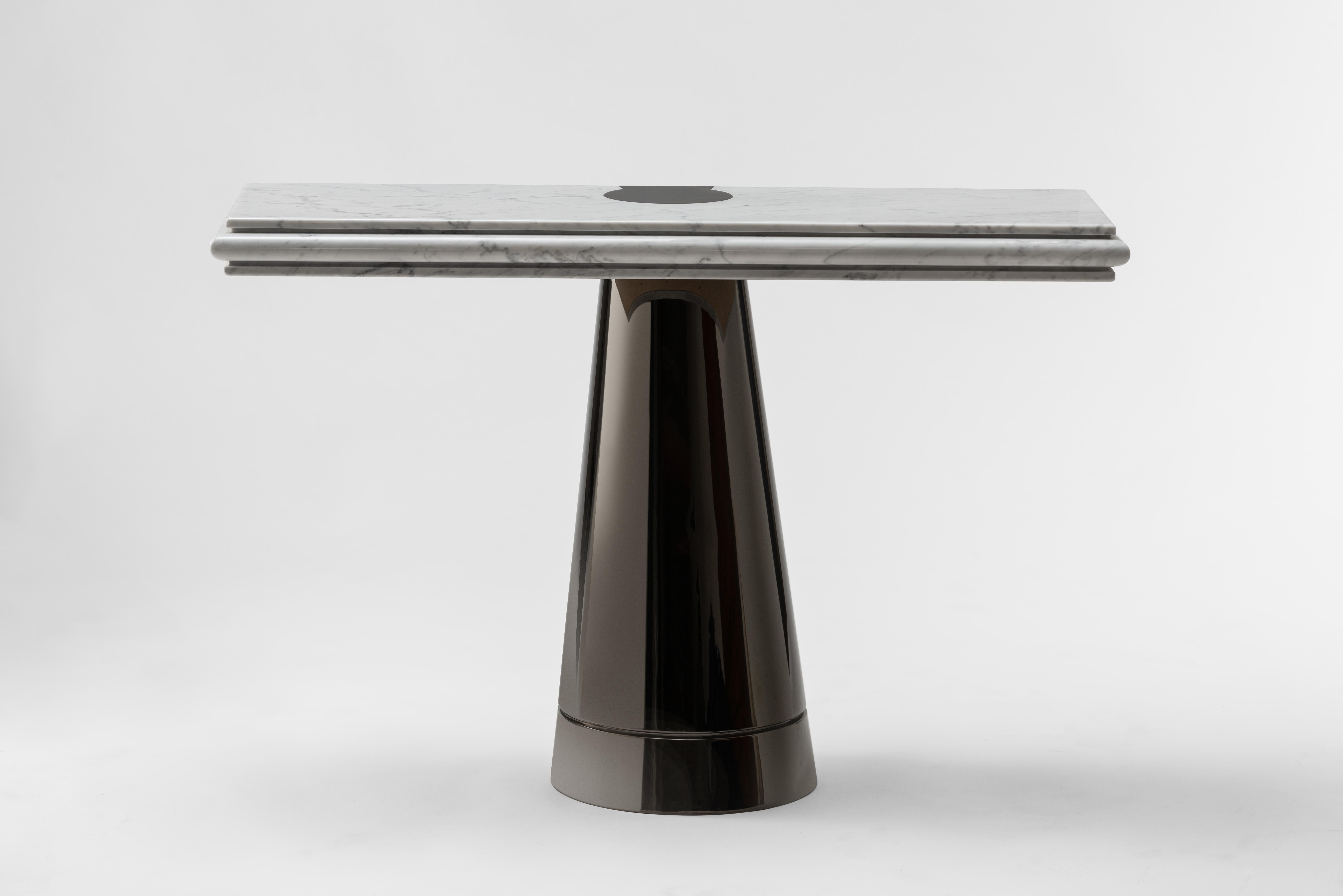 The Crocodile's Tear Side Table is a stunning piece of furniture that is both functional and poetic in its design. The metal base, finished in black polished chrome, flows through the marble tabletop like a teardrop, adding a touch of artistry and