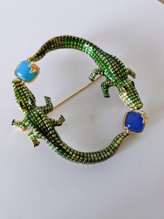 Crocodile Brooche in enamel paint and gold plated creation in blue stones