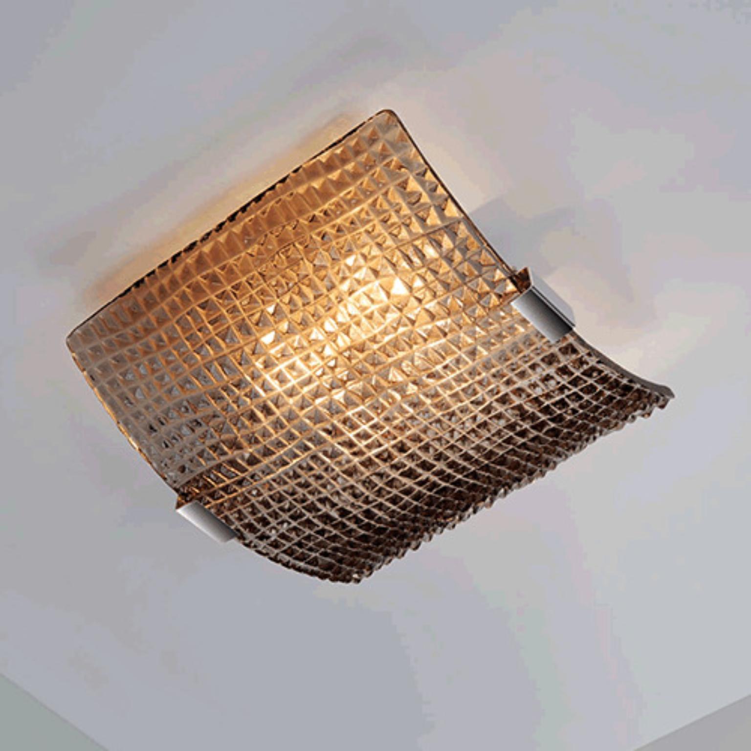 Crocodile CROPLMBG Ceiling Lamp by Mazzega 1946
Dimensions: W 50 x D 50 x H 17 cm.
Materials: Frame: Polished Chrome. 
Diffuser: Tobacco.
Weight: 009 Kg. 

The roots of Mazzega1946 are in Murano, a land of master glassmakers who still today preserve