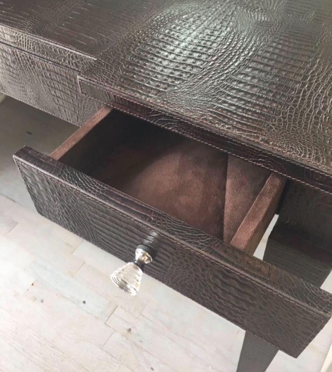 This leather desk is very unique and in good condition 