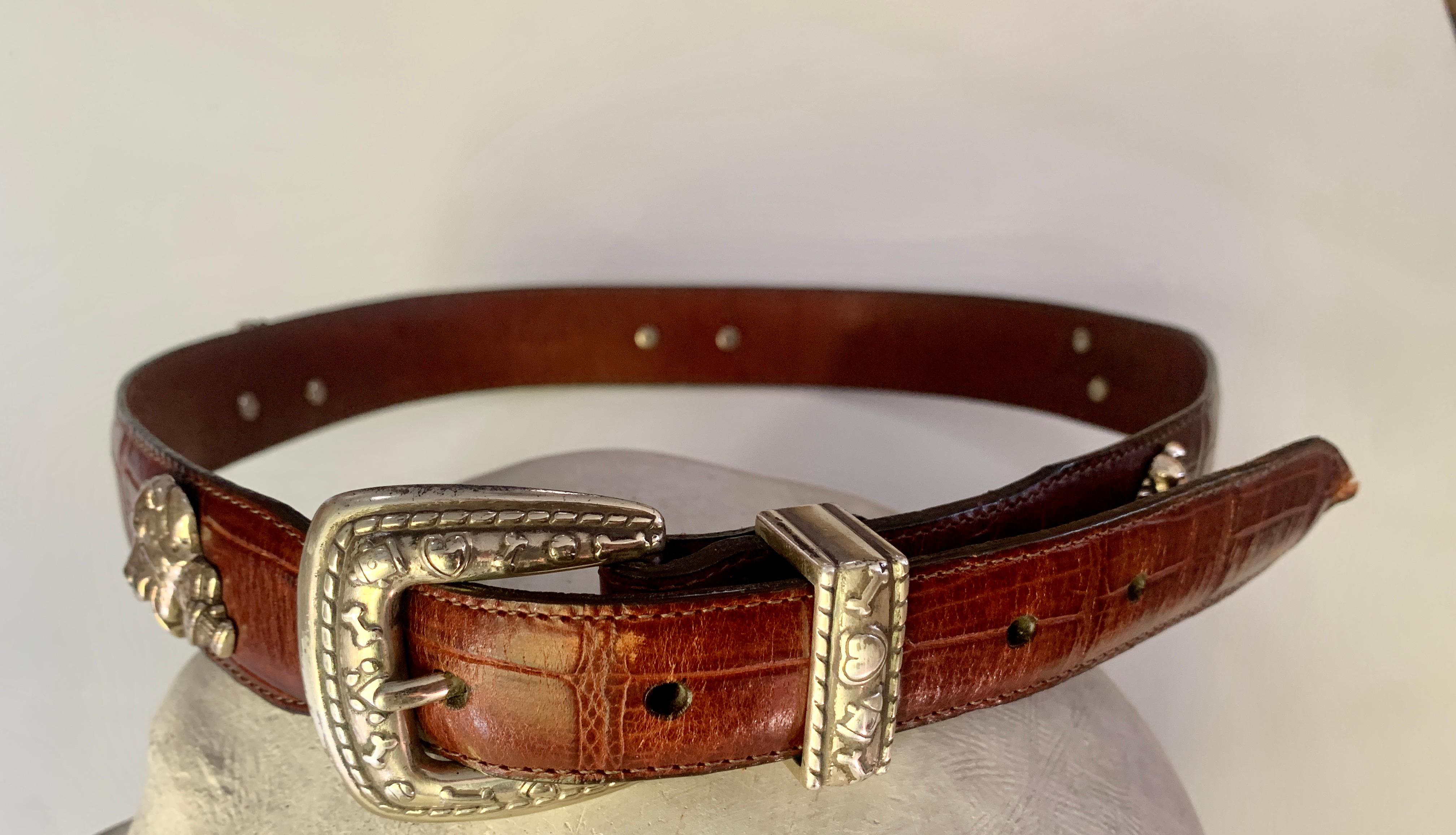A leather embossed of Crocodile belt or dog collar - A very special piece. To be used as a belt or a collar for a large dog. We believe this piece was made as a belt, but would use it equally as well as a dog collar... the dogs spread around the