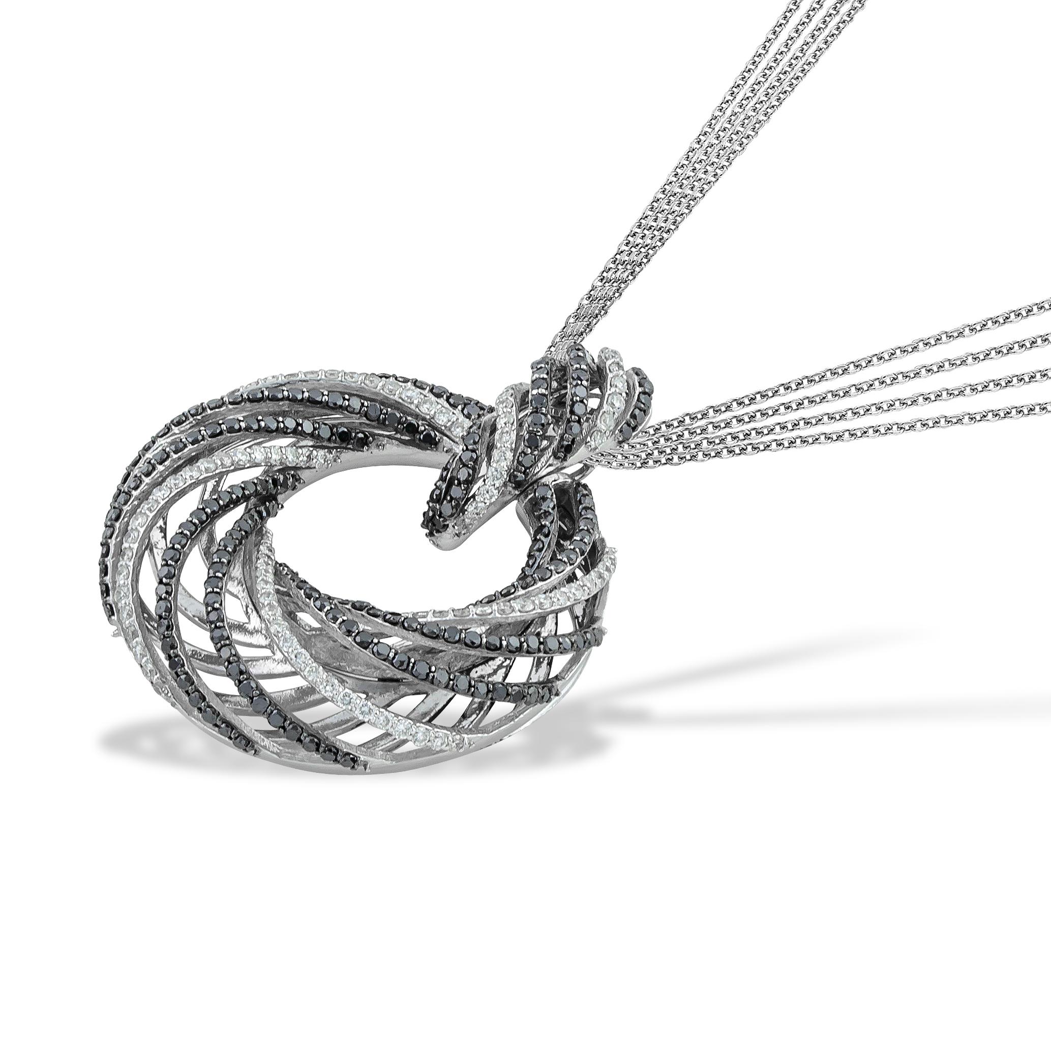 Round Croissant Black and White Pave Diamonds Pendant Necklace in 18kt White Gold. This diamond masterpiece comes with Multi Chain ( x4 diamond cut rolo chain) in 18kt White Gold. This necklace belongs to 