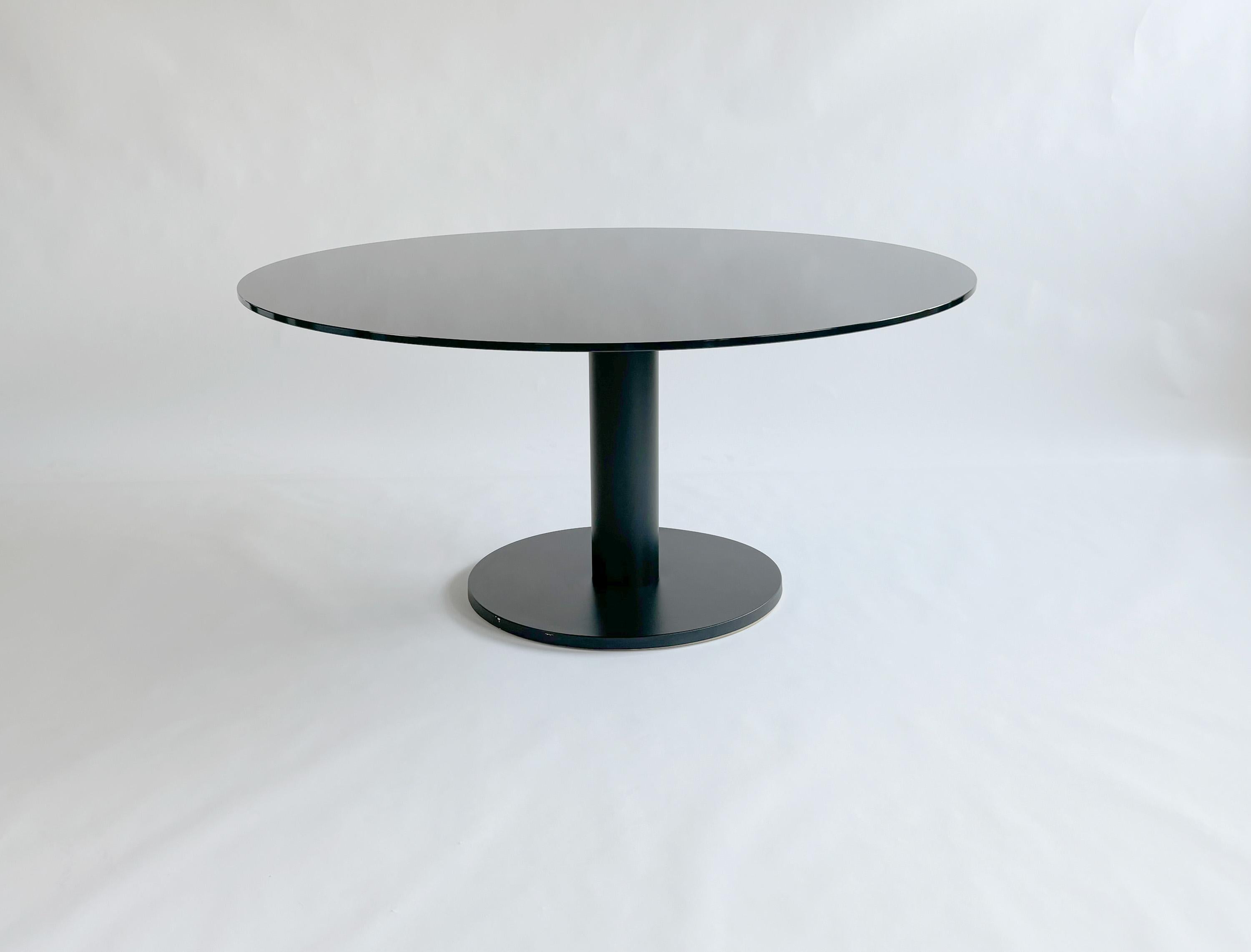 Croma Table by Massimo Morozzi for Edra
2005 / 2006
Steel column and metal covered wood base painted black. Black back painted tempered glass.