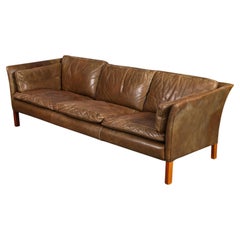 “Cromwell” Sofa in Dark Green Patinated Leather by Arne Norell