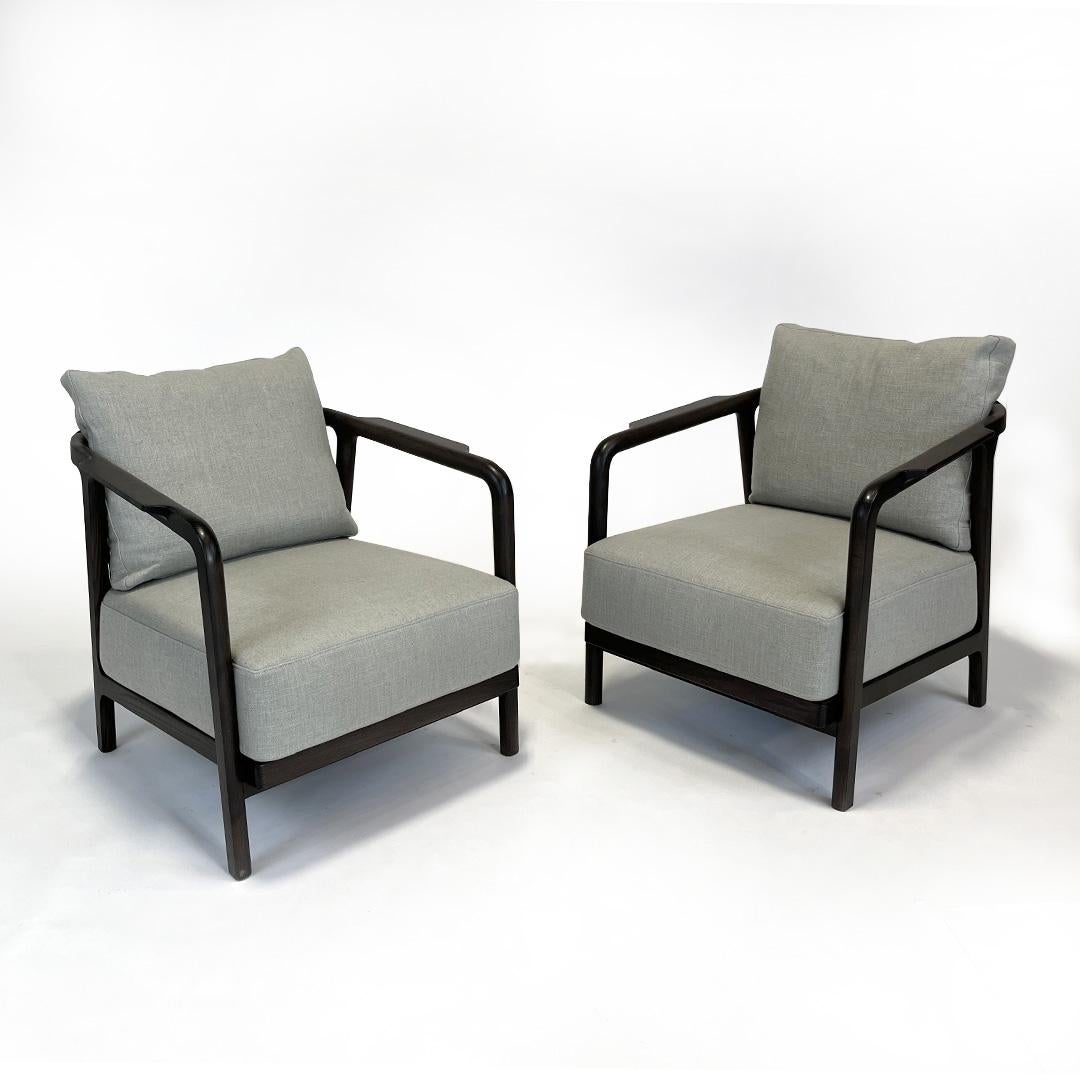 Crono Sessel von Antonio Citterio für Flexform
Braun gebeizter Eschenholzrahmen mit handumwickelter dunkelbrauner Rindslederschnur.
Sitz- und Rückenkissen aus Stoff.