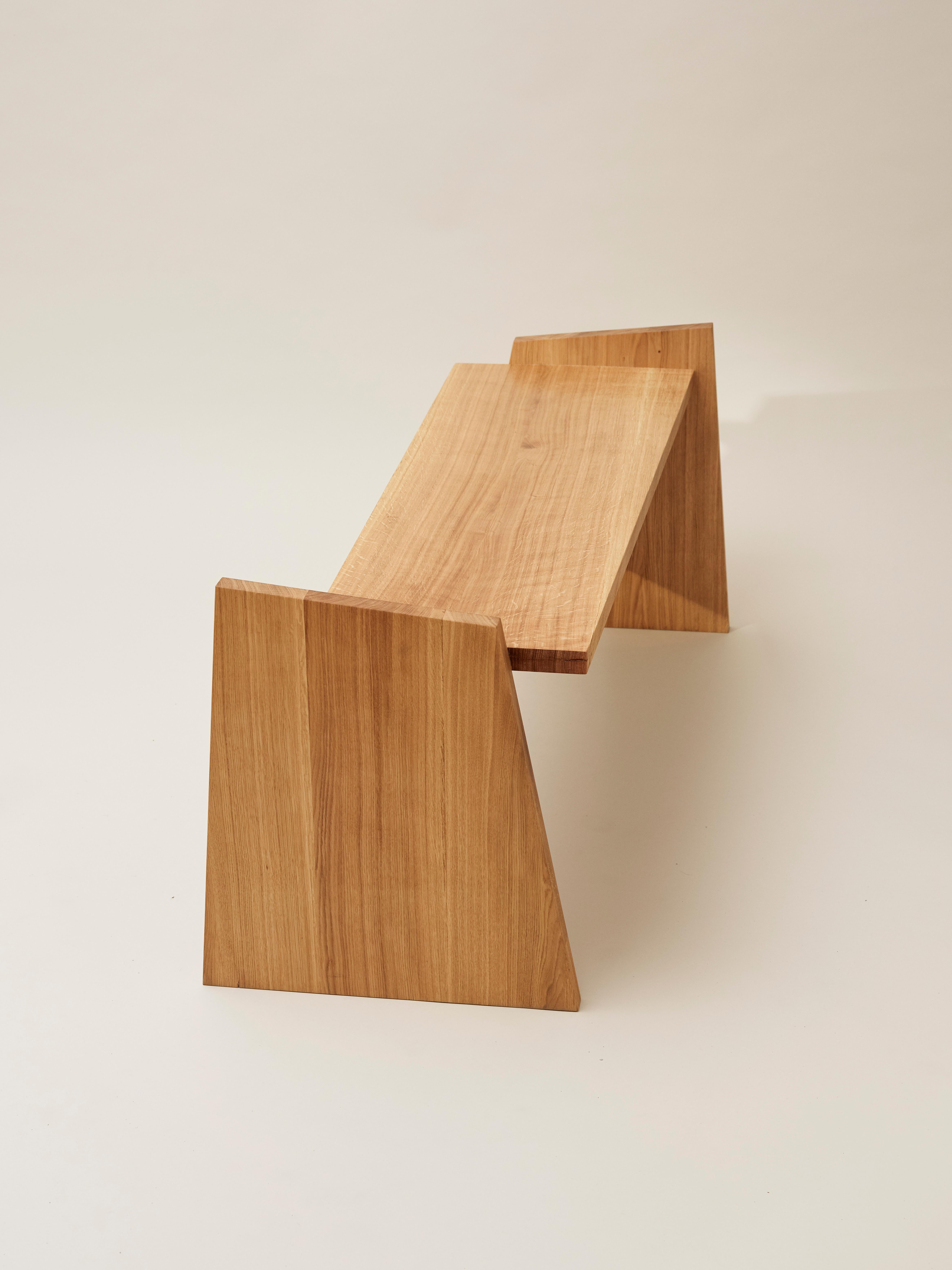 Crooked bench by Nazara Lazaro
Dimensions: H 57 cm x W 120 cm x D 52 cm
Materials: Massive oak with oil wax surface

Also available in natural massive oak, walnut, and white lacquered wood.

The Crooked Collection is an ongoing series of