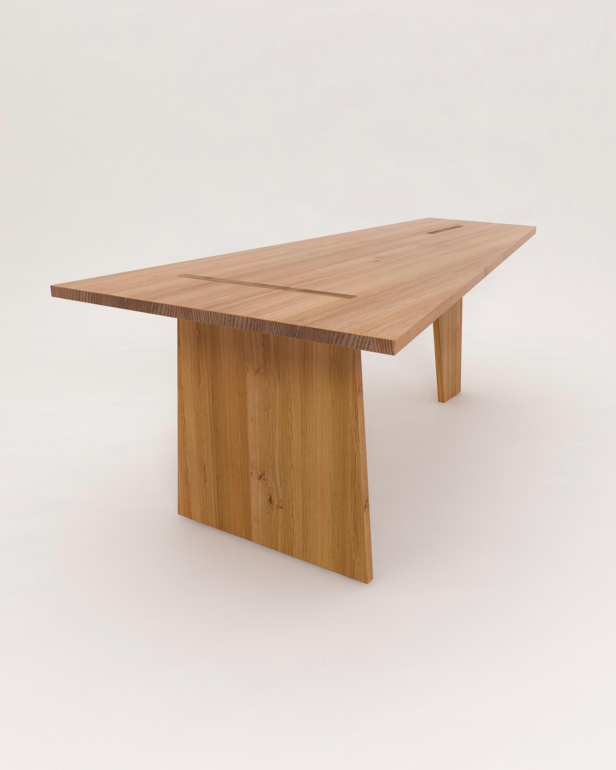 Crooked dining table by Nazara Lázaro.
Dimensions: H 75 x W 200 x D 100 cm.
Materials: Massive oak with oil wax surface.

All pieces are available in natural massive oak, walnut and white lacquered wood.
Additional sizes, woods and finishes are