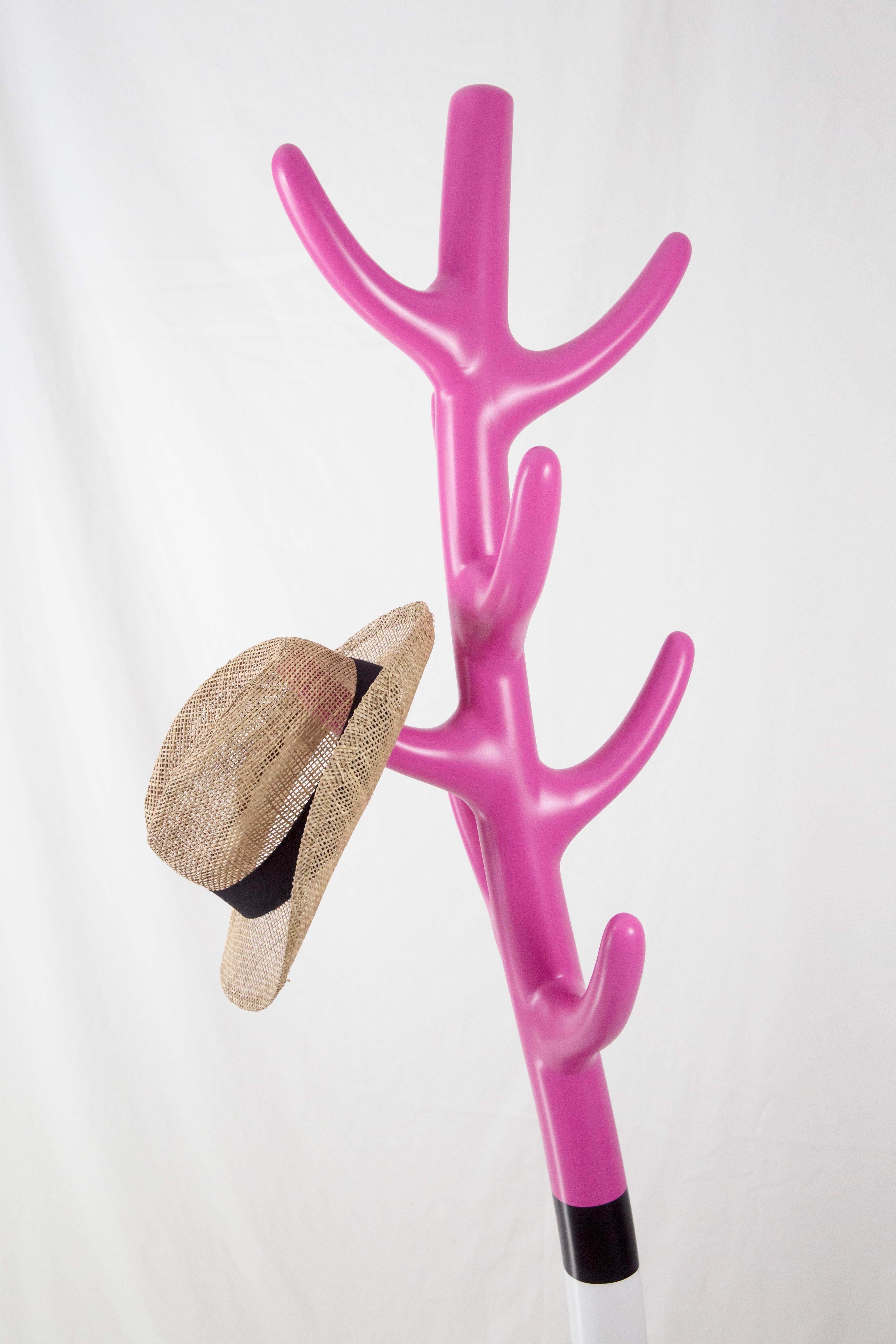 Overview:
Brighten up your space with the Crooked Coat Rack, a blend of functional design and artistic innovation. This striking coat rack, in a vivid pink hue, not only offers practical utility but also serves as an eye-catching art piece, ensuring