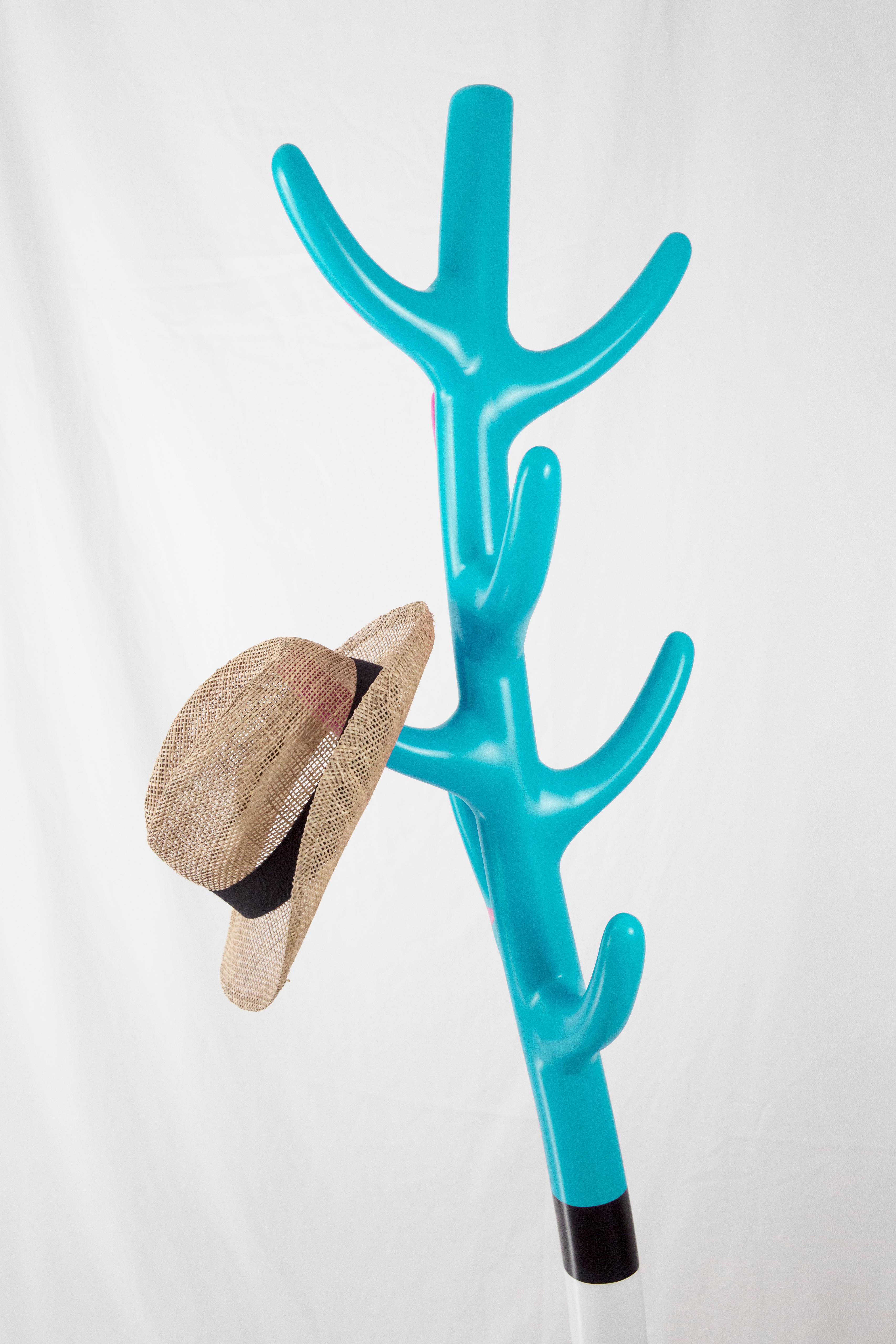 Overview:
Elevate your decor with the Crooked Coat Rack, a piece where art meets functionality. This sculptural coat rack, featuring a vibrant turquoise hue, serves not only as a practical item but also as a captivating art object that will draw the