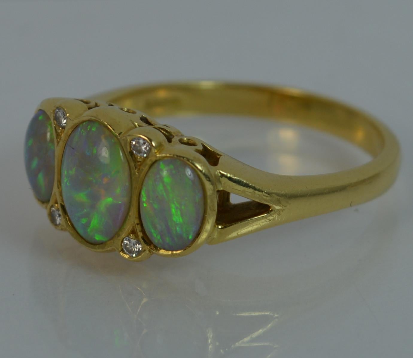 Oval Cut Cropp and Farr 18 Carat Gold Opal and Diamond Trilogy Ring