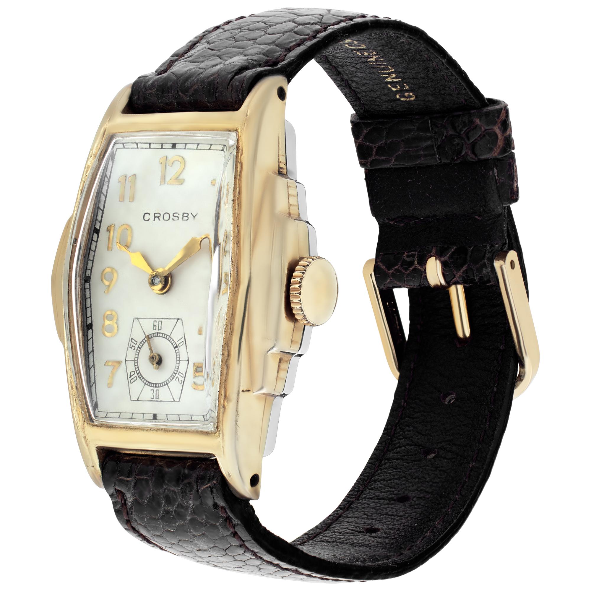 Unisex Crosby gold fill case, gold fill bezel, leather leather band with two piece clasp. Subsidary seconds Manual Certified pre-owned. Circa 1950 Fine Pre-owned Crosby Watch. Certified preowned Vintage Crosby watch on a Brown Leather band with a