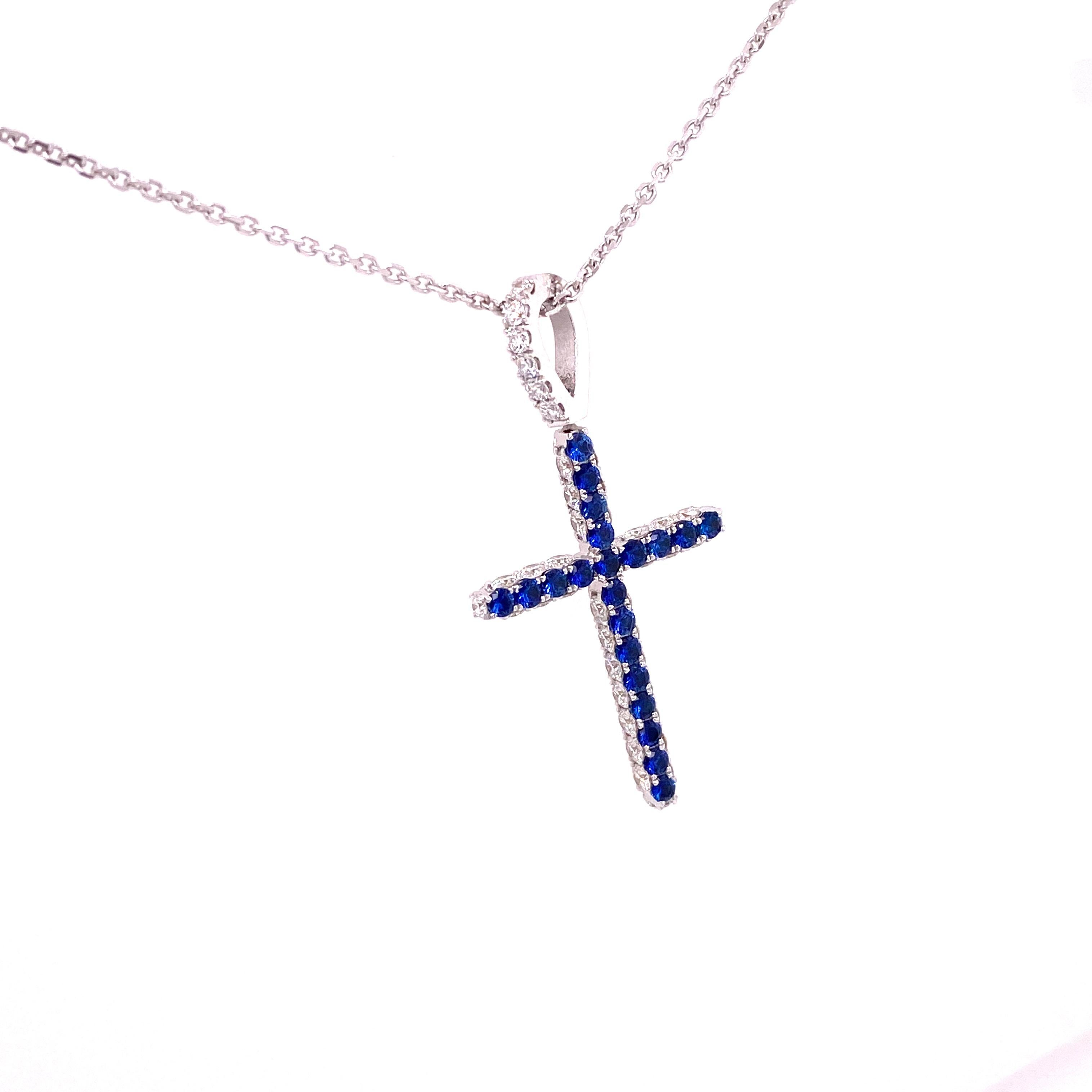 CROSS-4S - 18KW Cross Pendant with Diamonds & Sapphire along with 18KW 16” Chain In New Condition For Sale In New York, NY